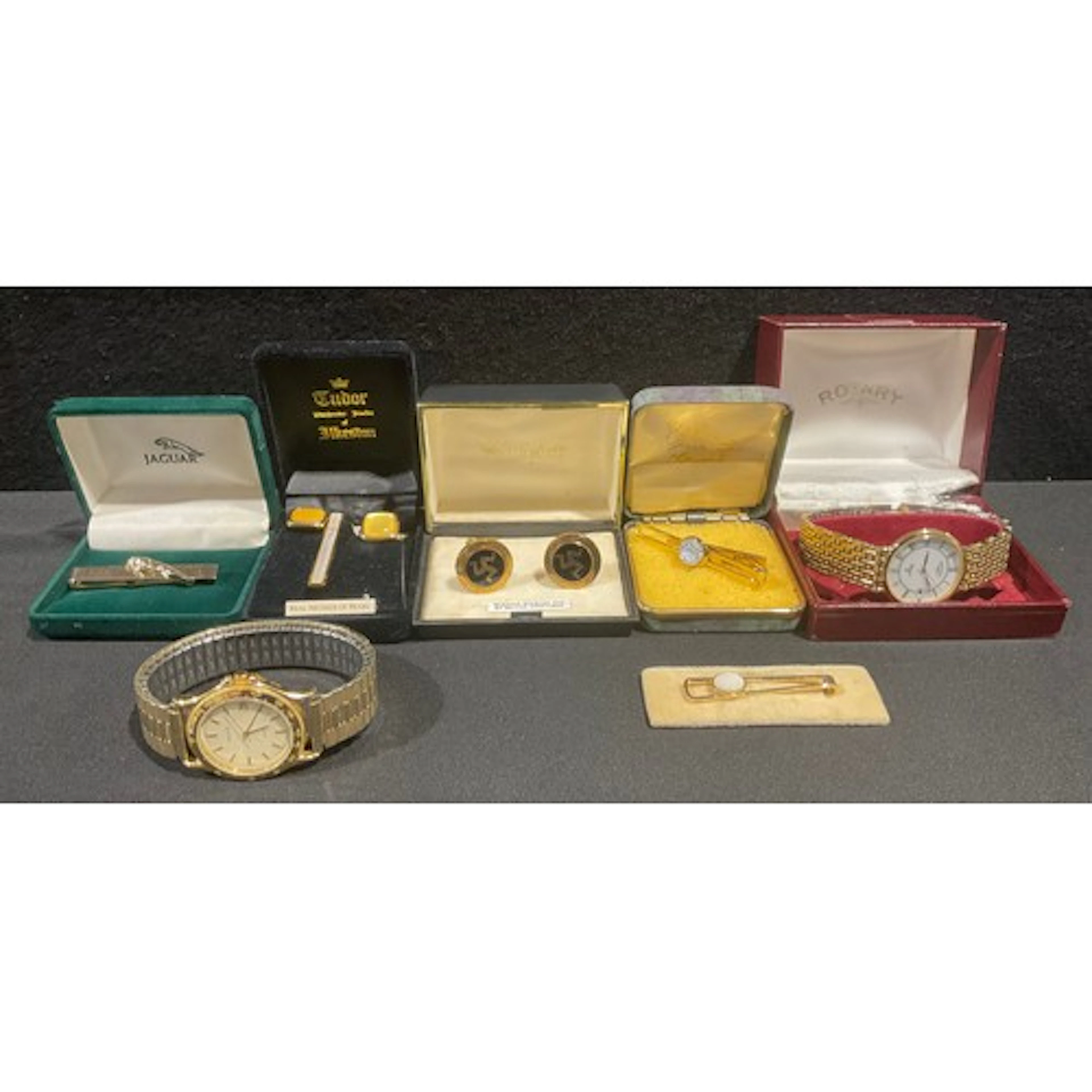 A gentleman's Jaguar tie clip, 5.5cm, boxed; a Stratton Cait...