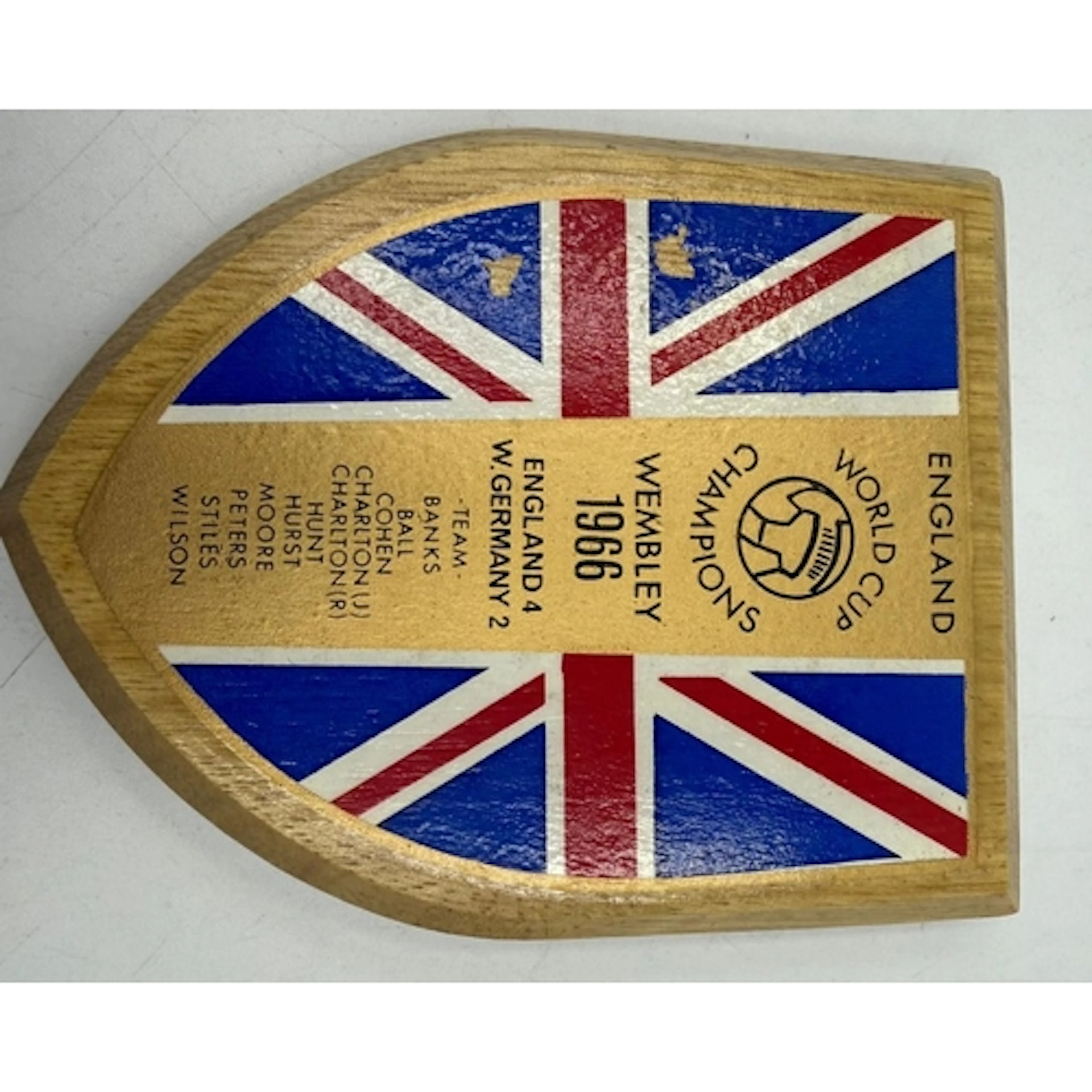 A commemorative shield celebrating the 1966 world cup