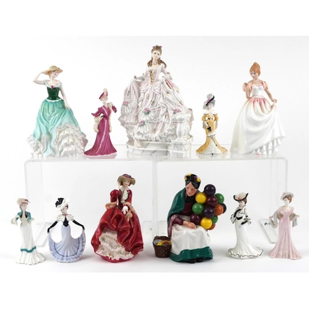 Collection of Royal Doulton and Coalport china figures inclu...