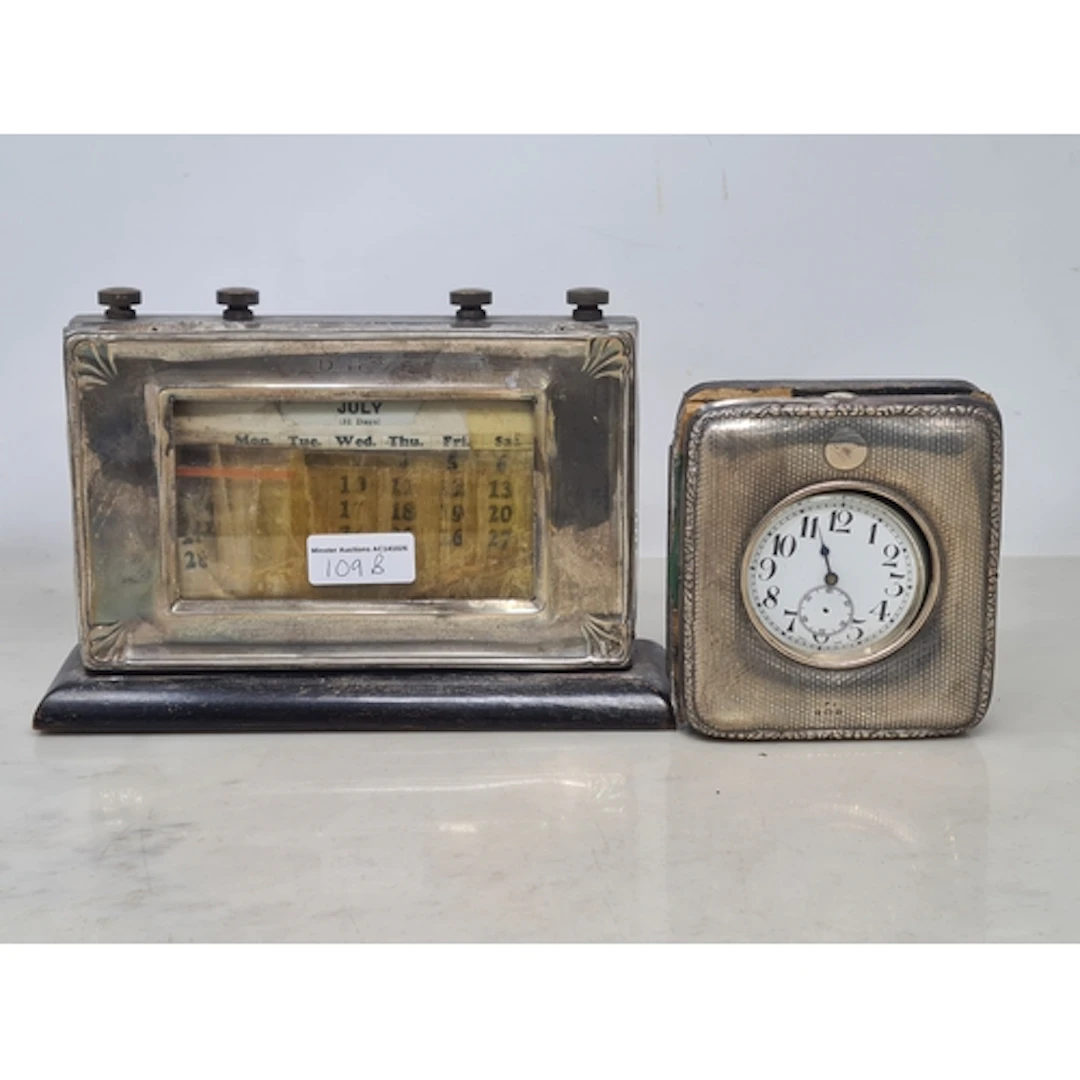 A George V silver mounted Calendar, Birmingham 1930, and a s...