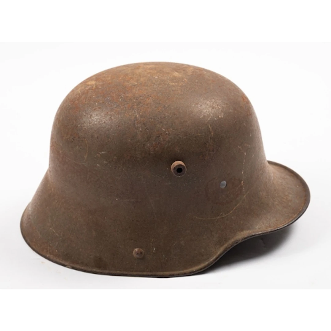 A WWII German M42 steel helmet. Stamped ET66 to the inside, ...