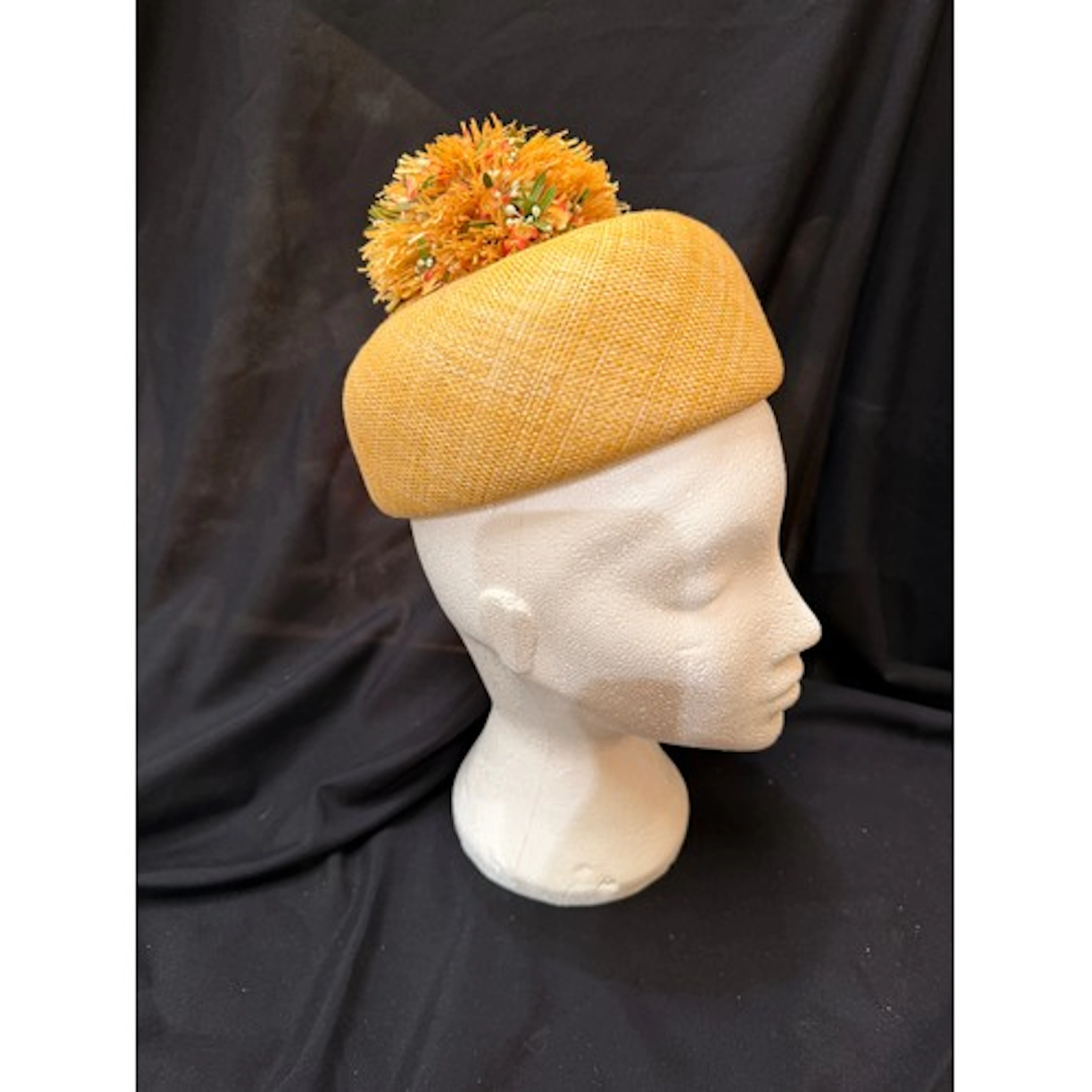 Graham Smith for Fortnum and Mason, a 1968 yellow straw pill...