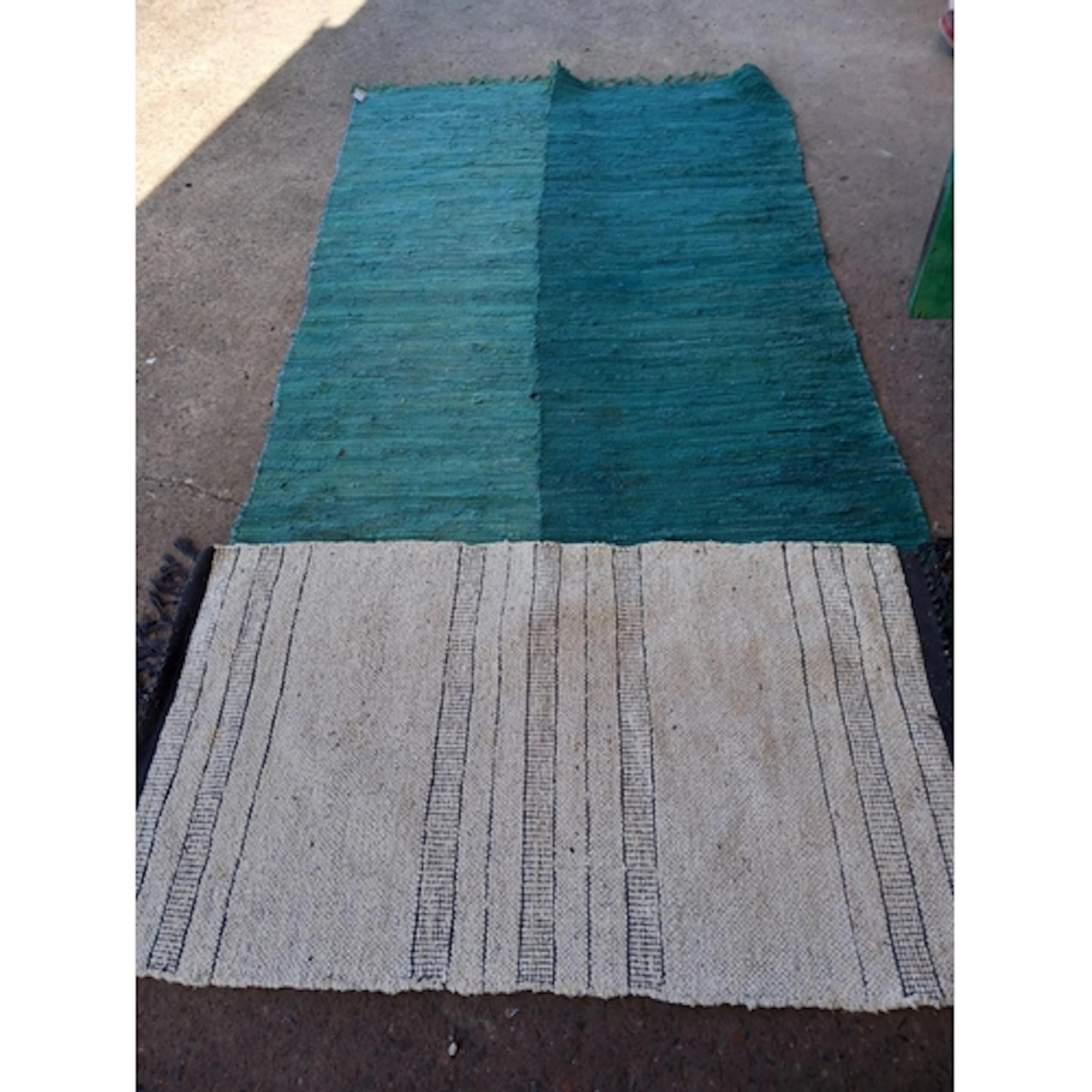 Two green runners 201 x 70cm and another rug 128 x 75cm all ...