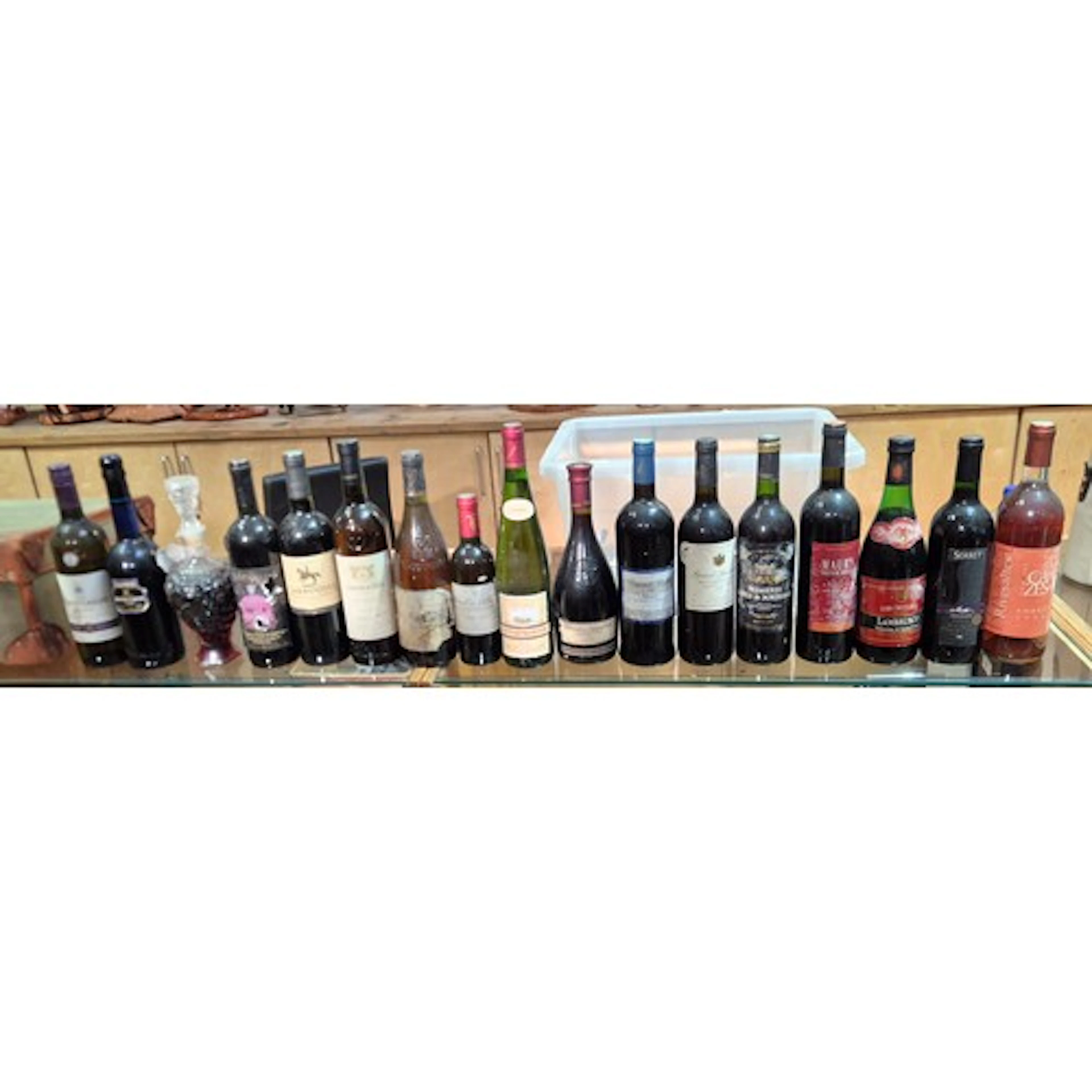 A group of assorted alcohol to include vintage red wines etc...