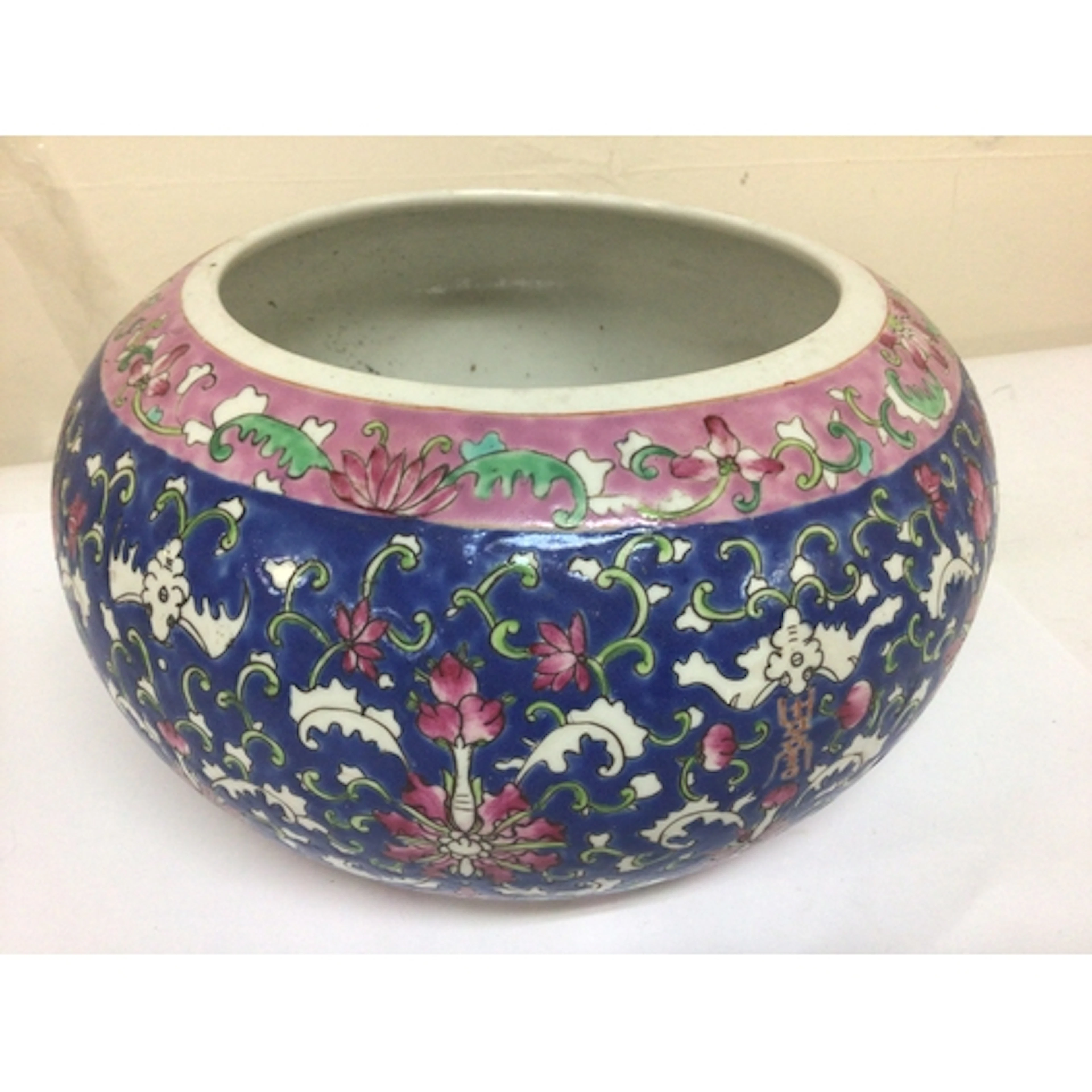 A Chinese porcelain jardiniere polychrome with a repea...