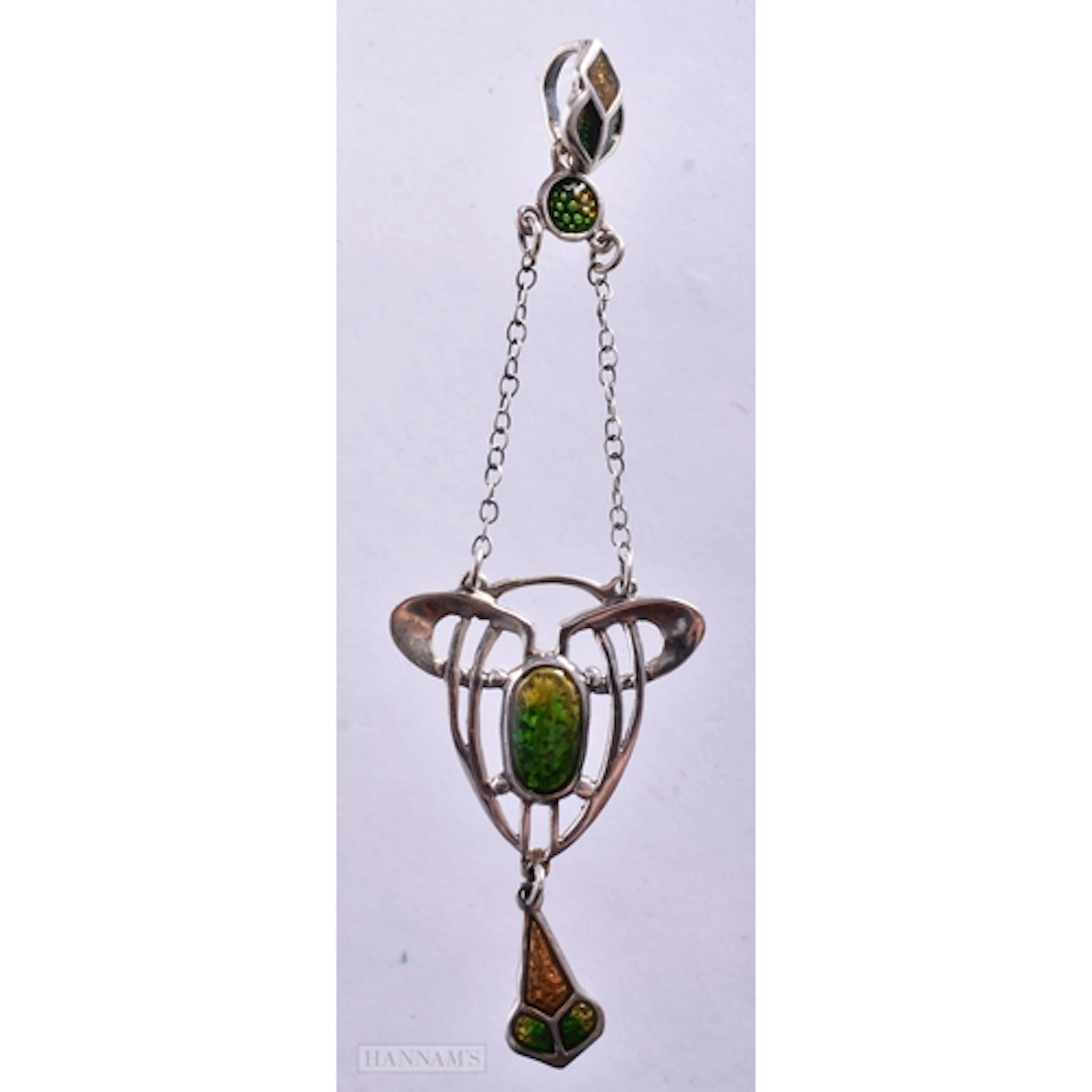 A Sterling Silver and Enamel Pendant. 9.1cm x 2.7cm, weight...