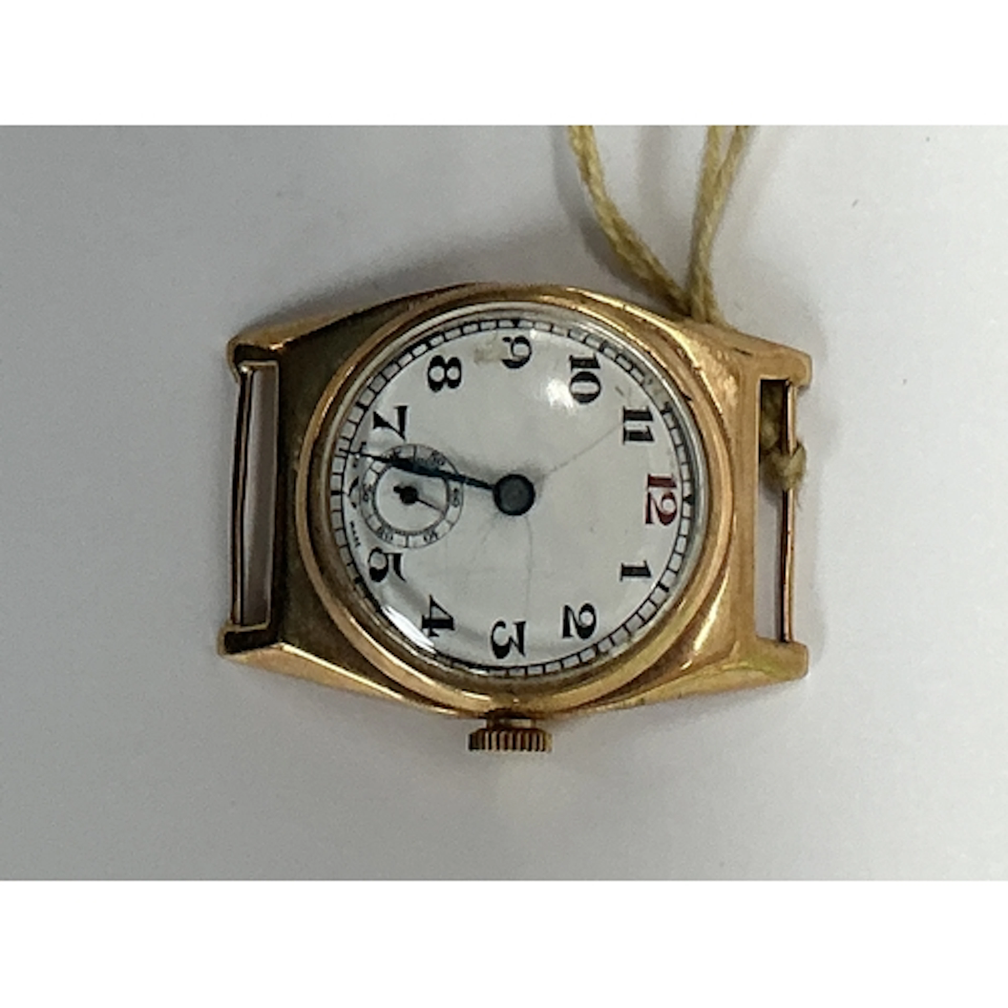 A vintage, Swiss made gold watch face.Approx: 3.5x 3.5cm.15....