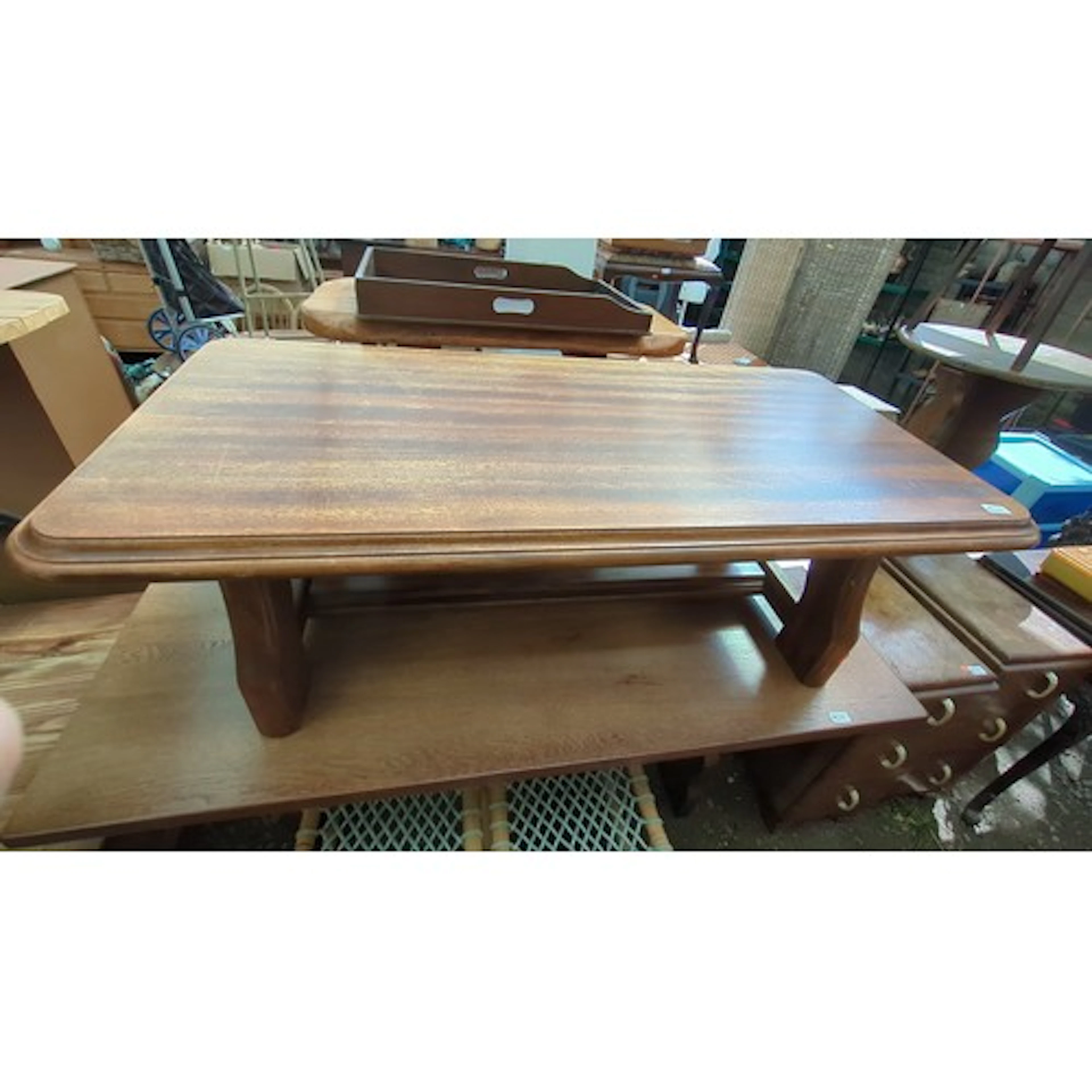 20th century hardwood coffee table, the top with rounded cor...