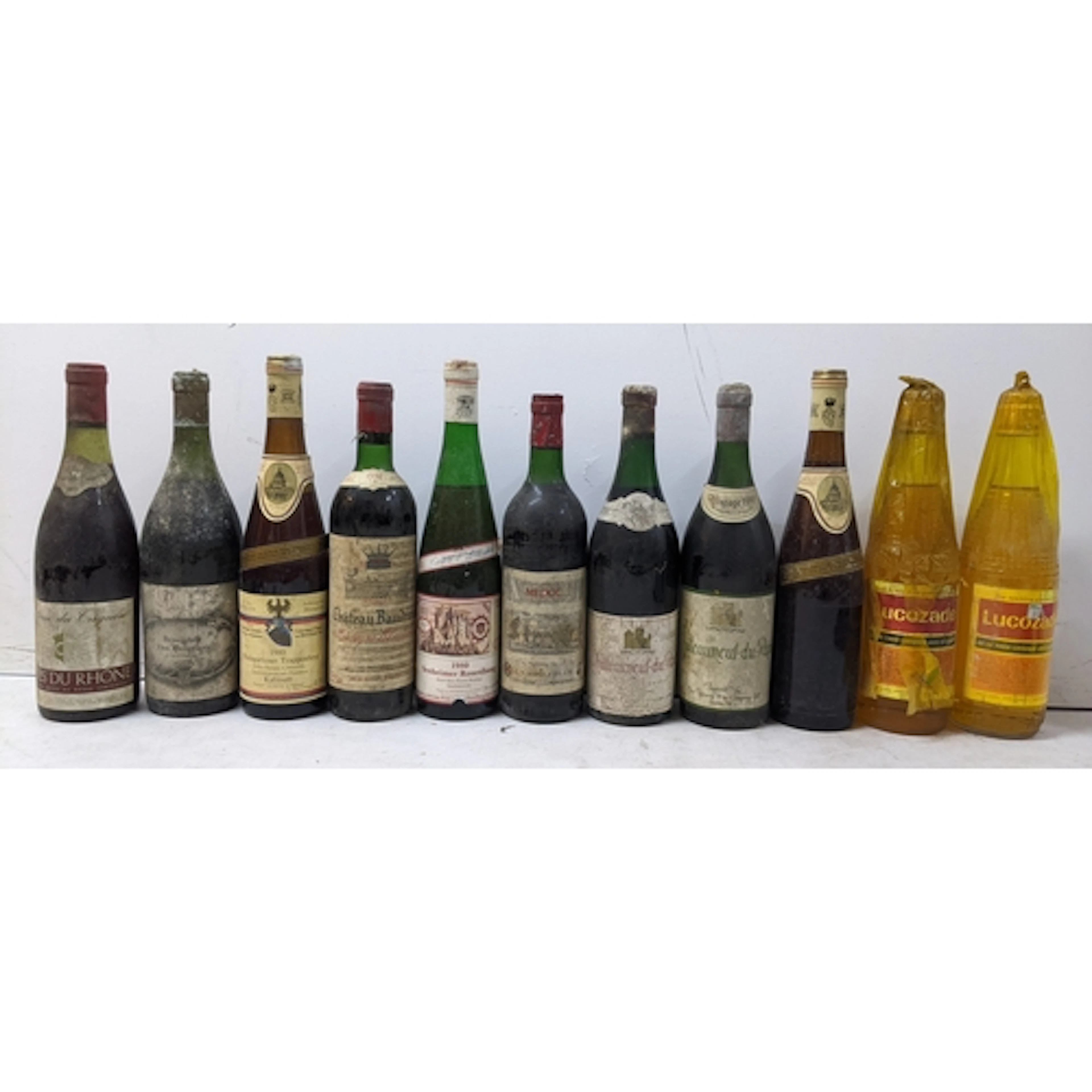 A mixed group of ten bottles of vintage wine and Lucozade, c...