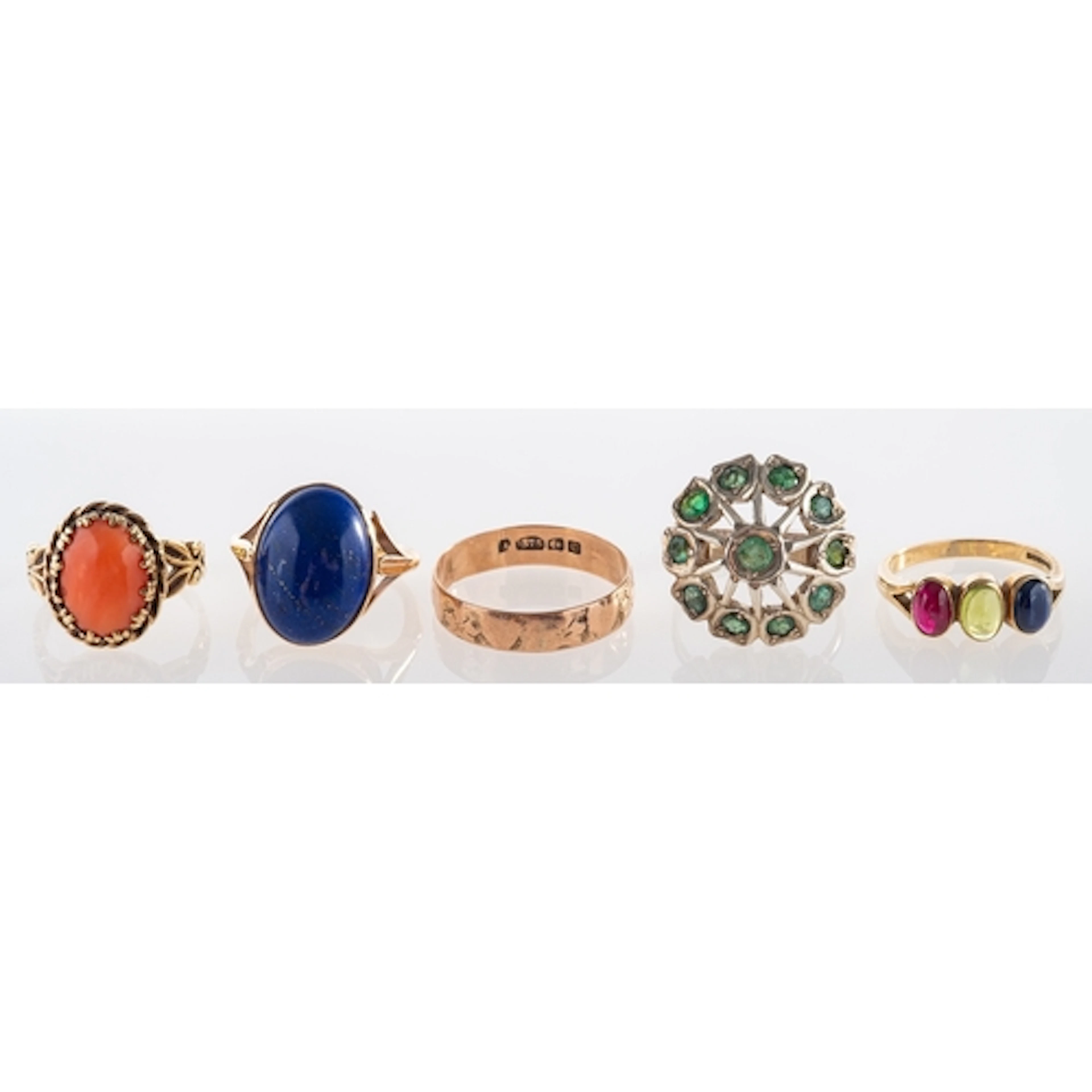 Five rings, four being stone set dress rings including lapis...