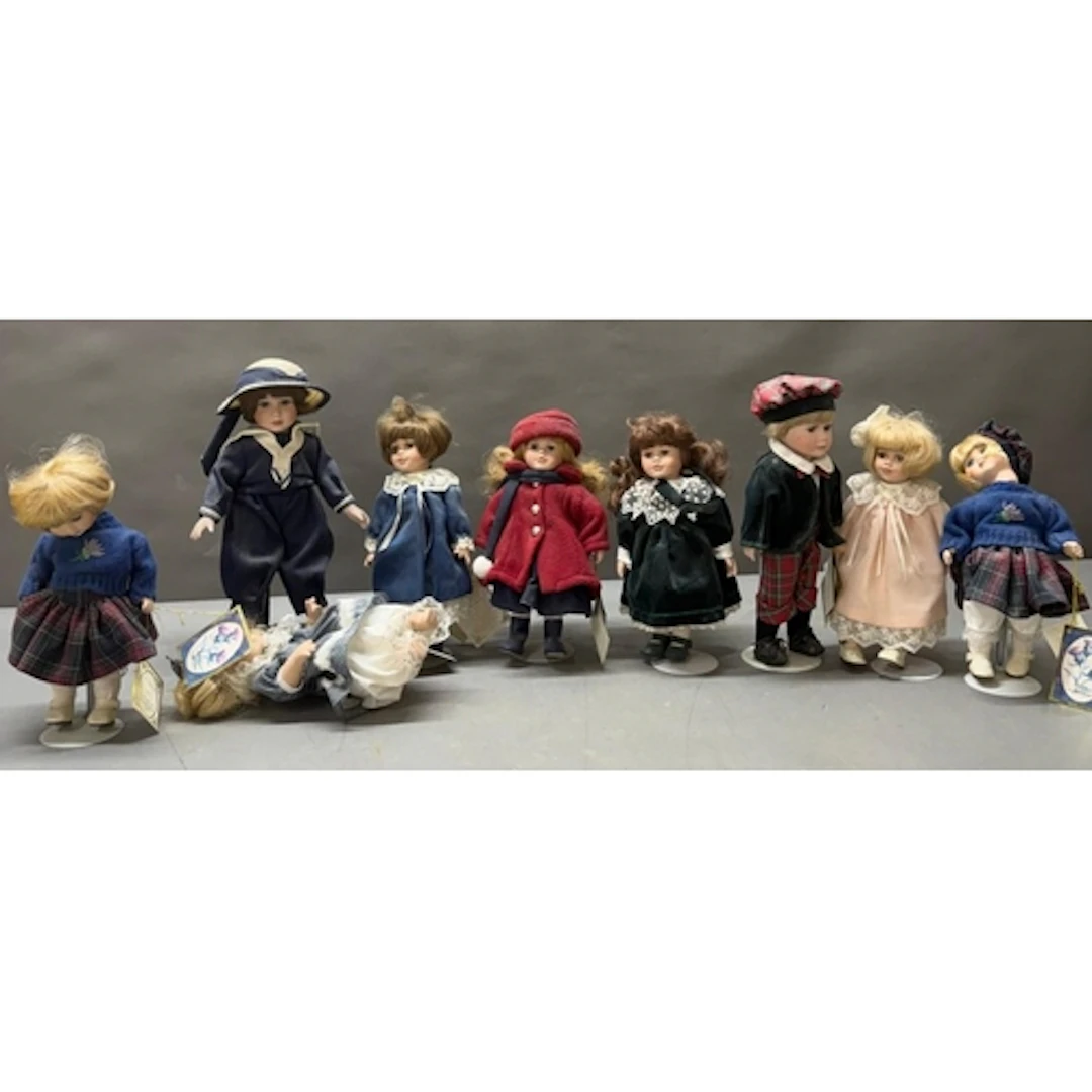 A selection of Alberon dolls on plinths.