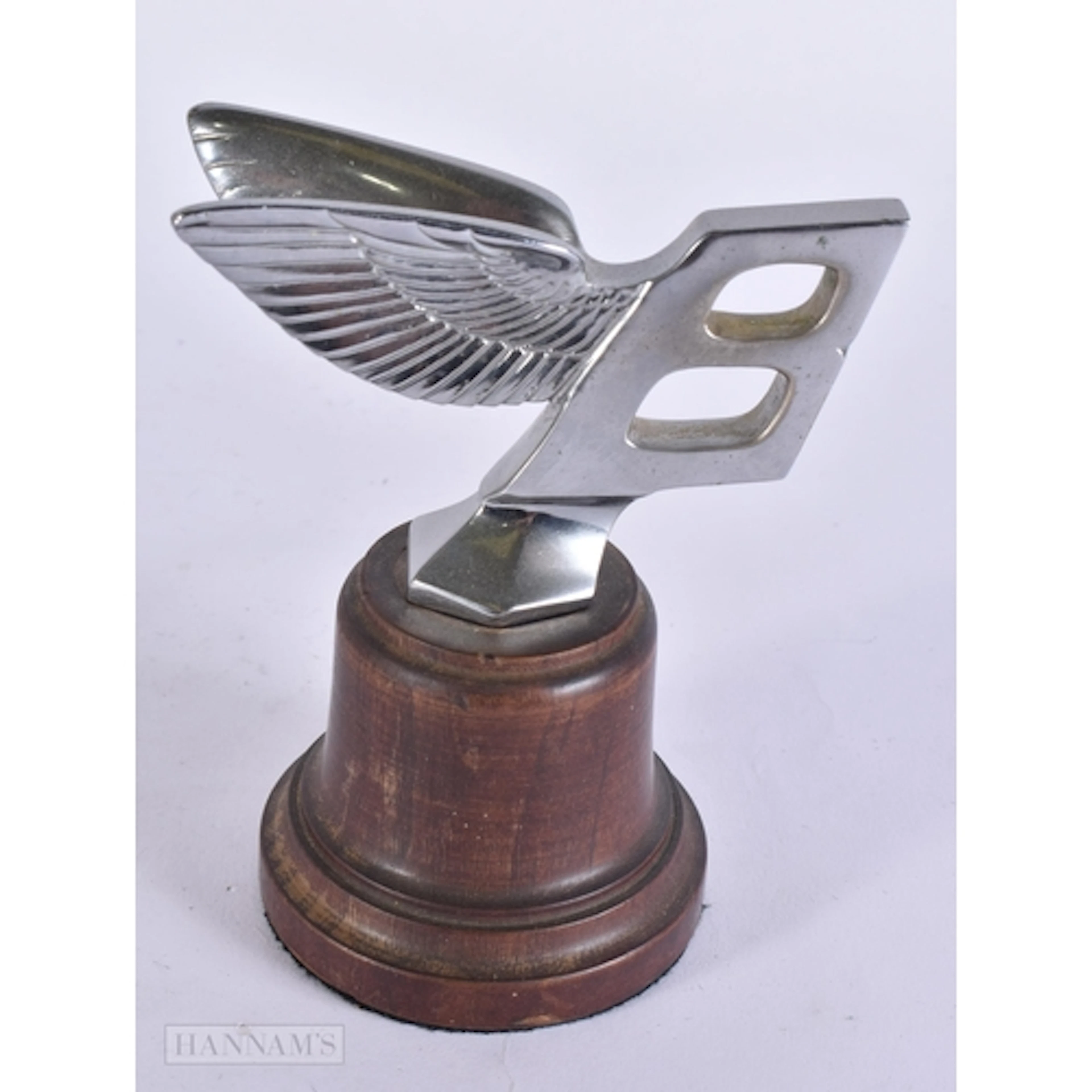 A BENTLEY 'FLYING B' CAR MASCOT. 12 cm high.