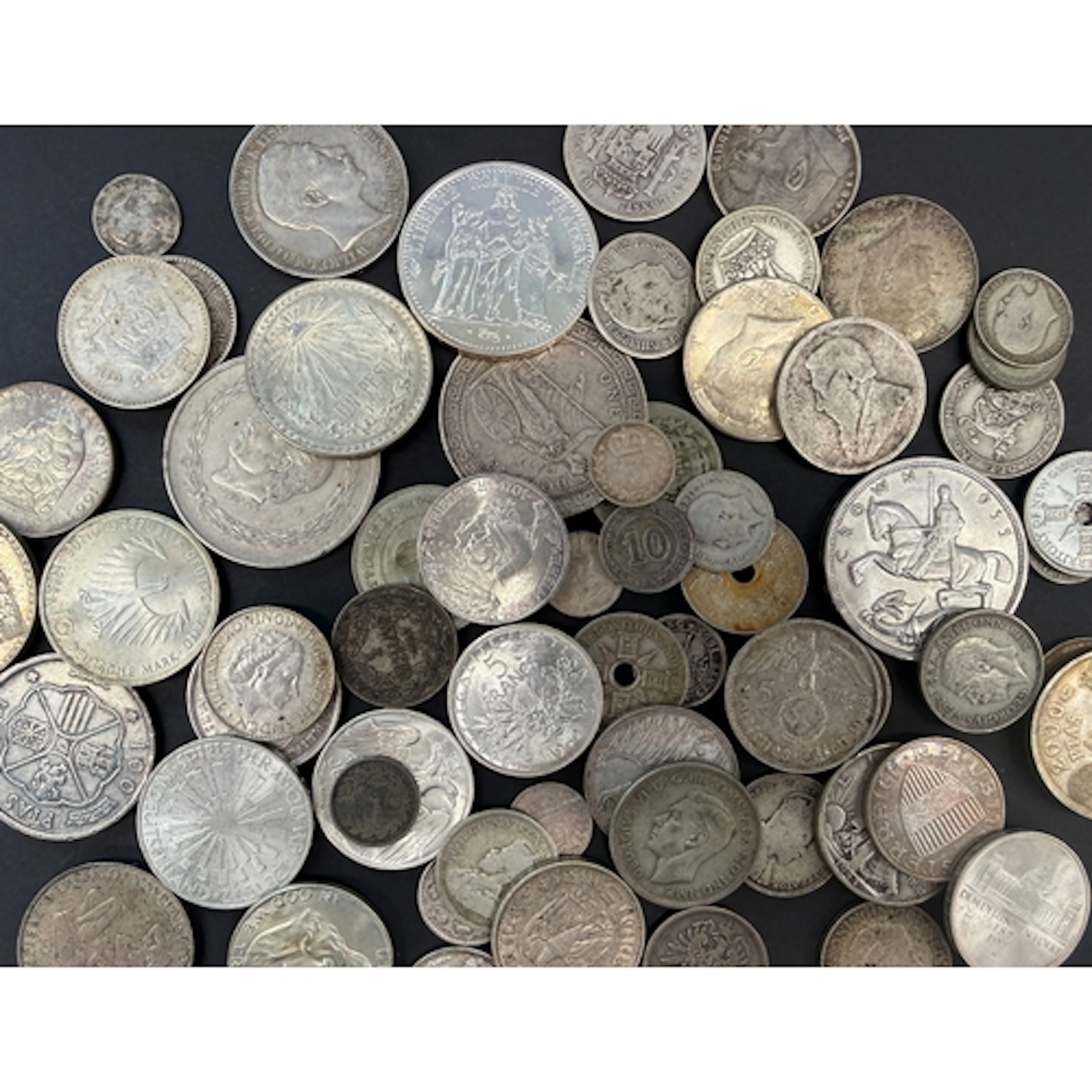 A group of mainly 20th Century World circulated silver coins...