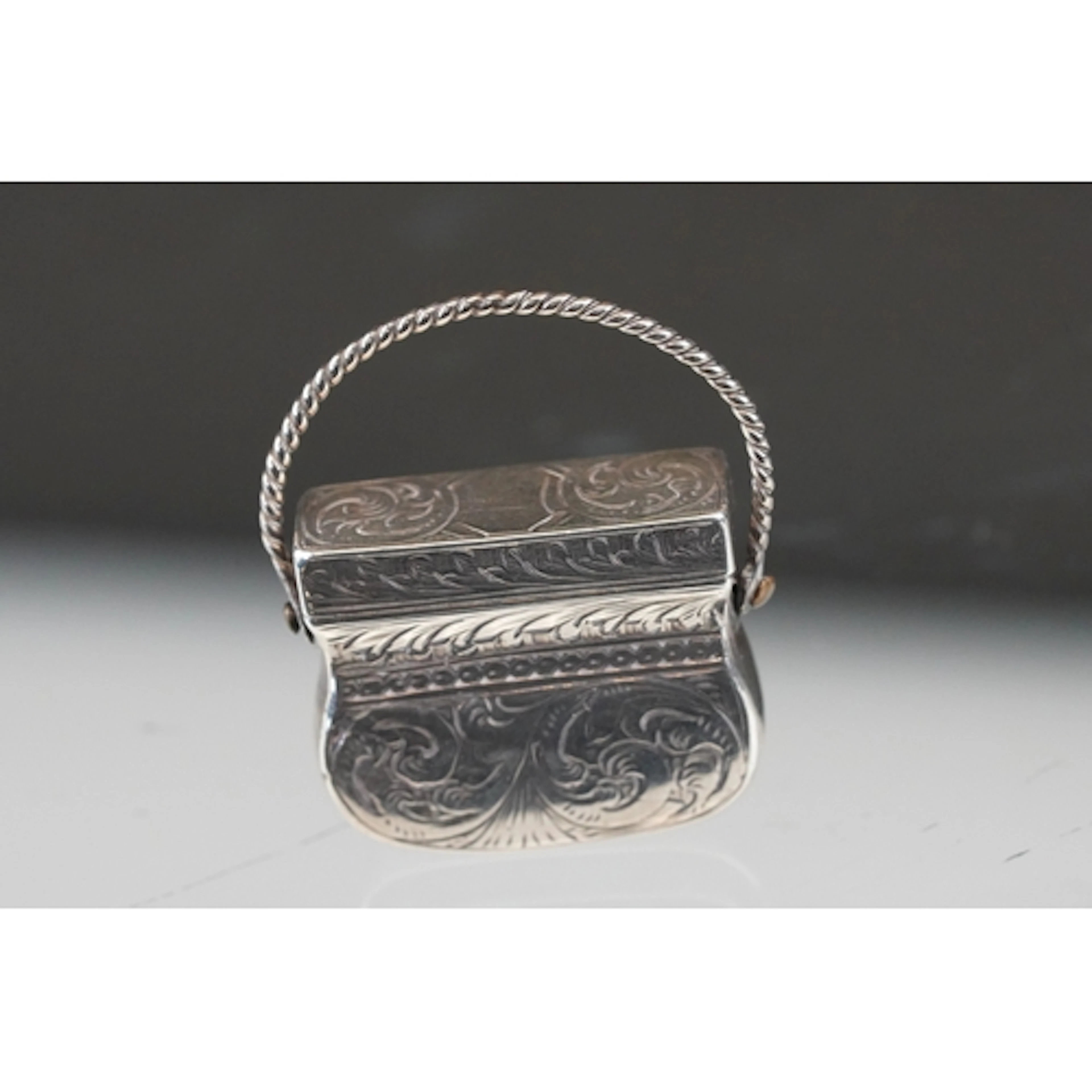 Victorian silver foliate engraved vinaigrette in the form of...