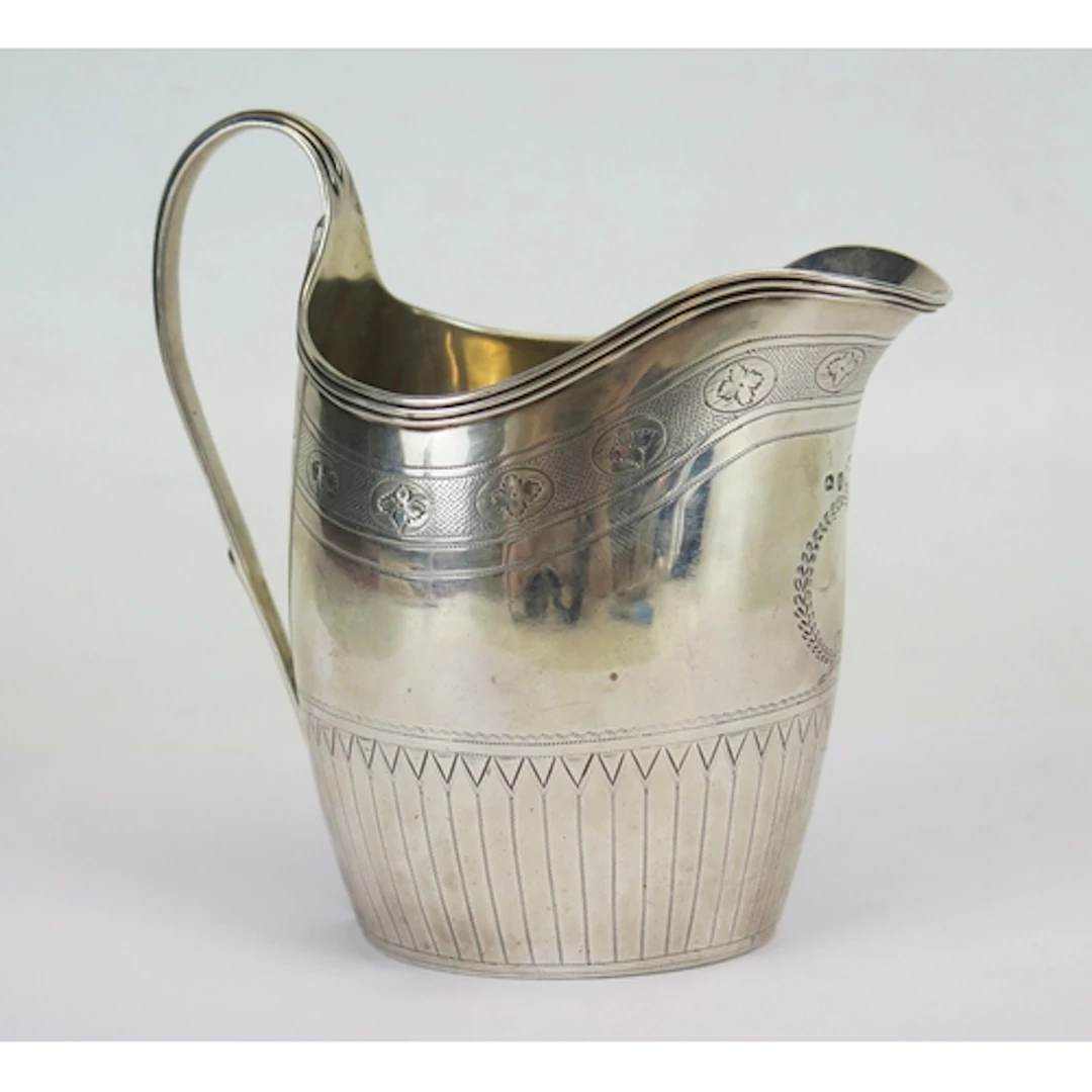 A George III silver cream jug, maker's mark worn, London, 17...