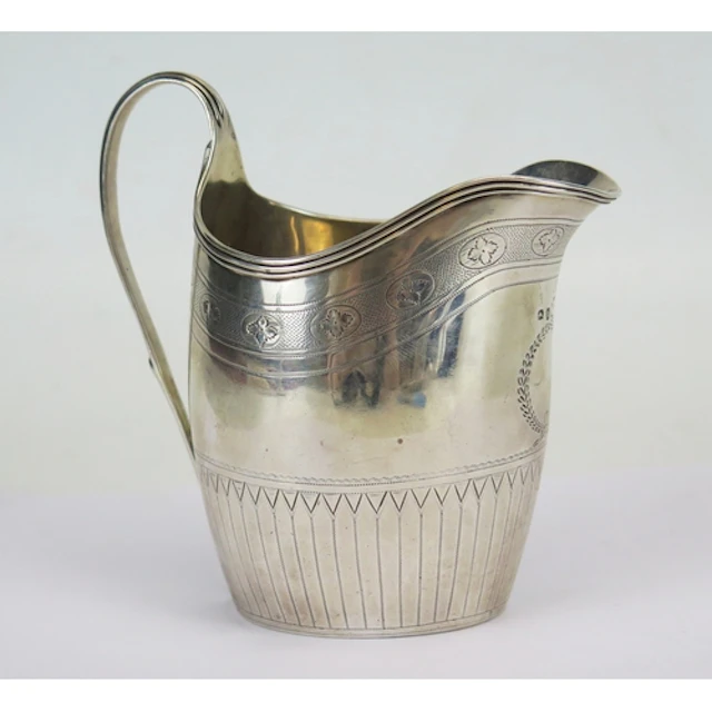 A George III silver cream jug, maker's mark worn, London, 17...