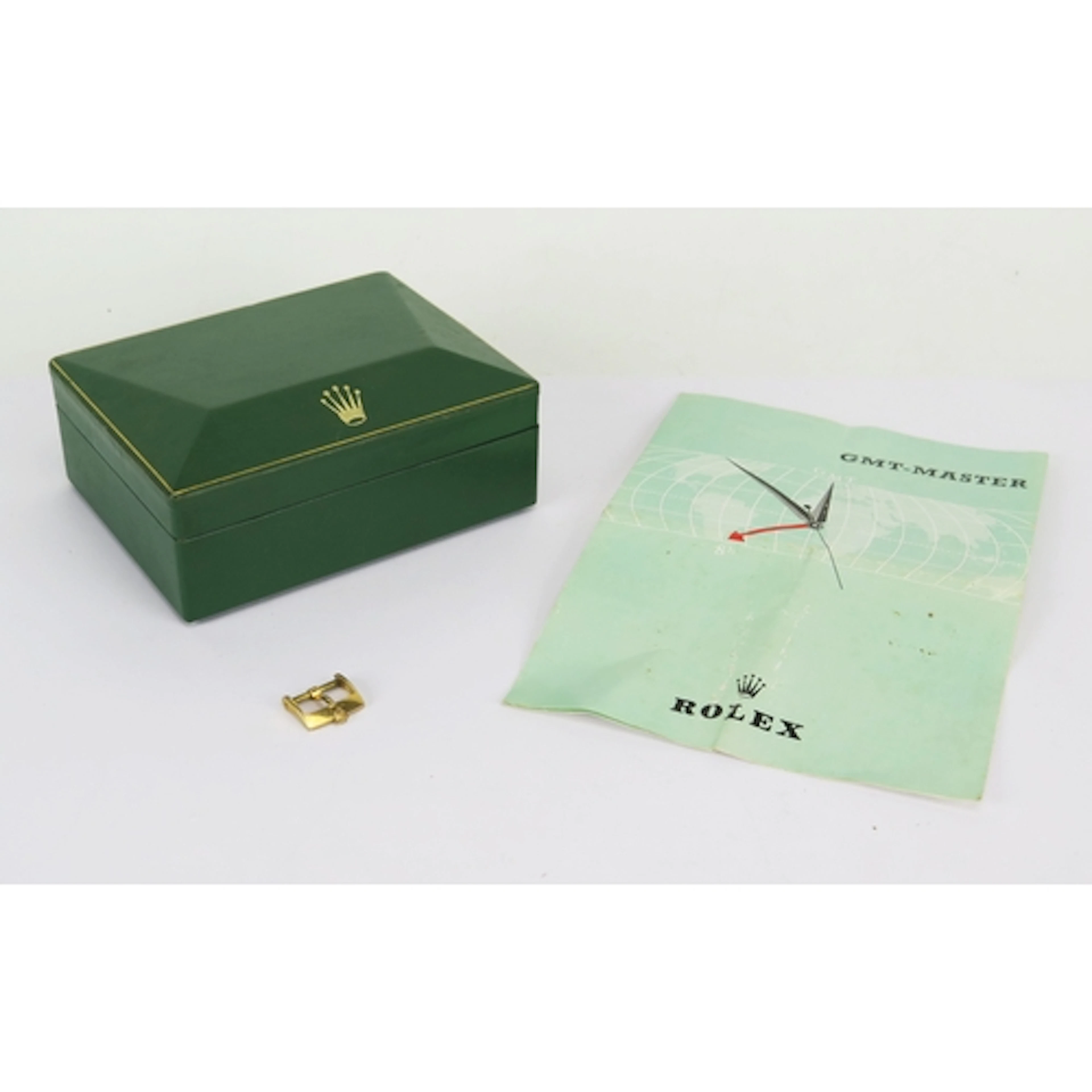 A Rolex coffin shaped watch box with GMT-Master leaflet and ...