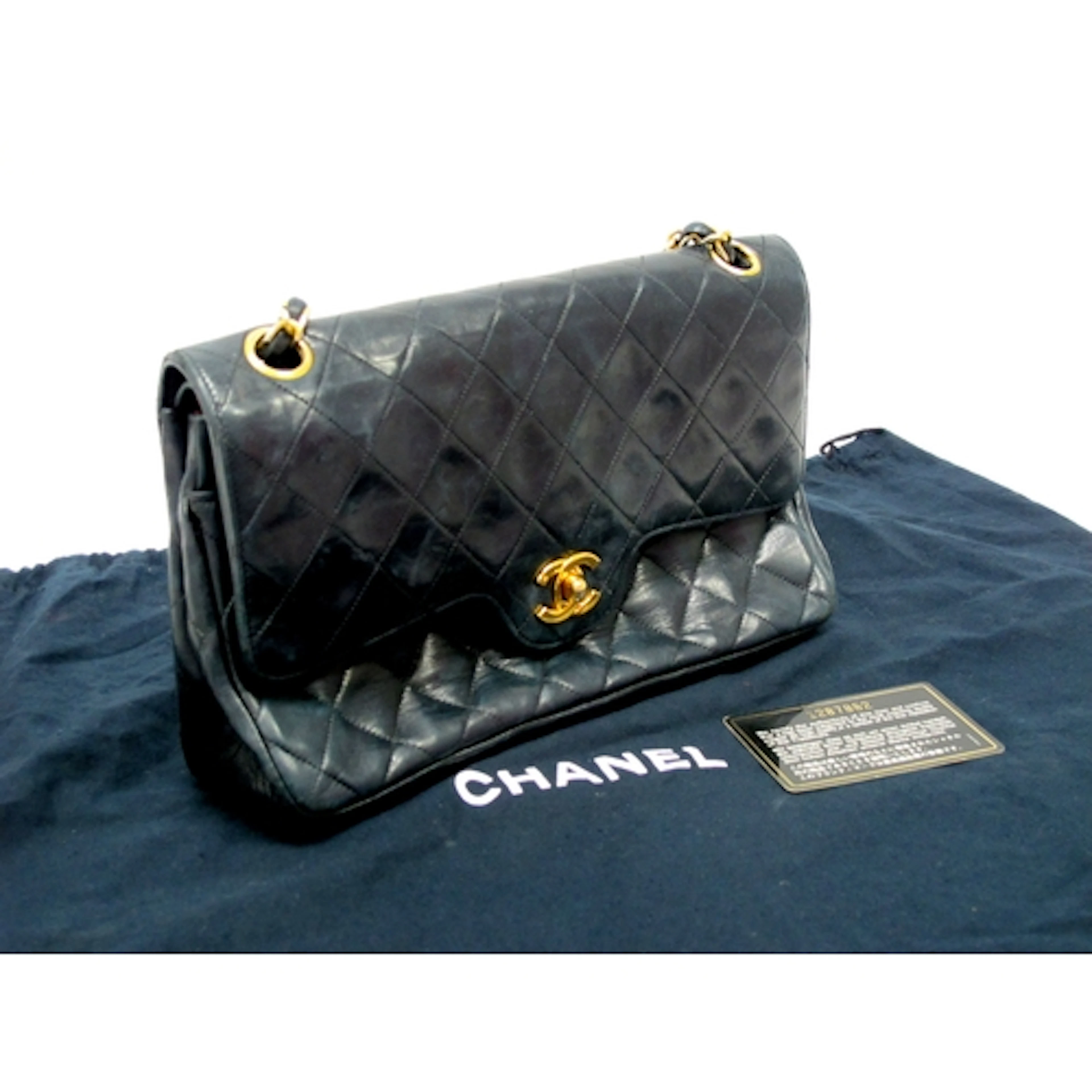 CHANEL; A Medium Classic Double Flap Handbag, quilted navy l...
