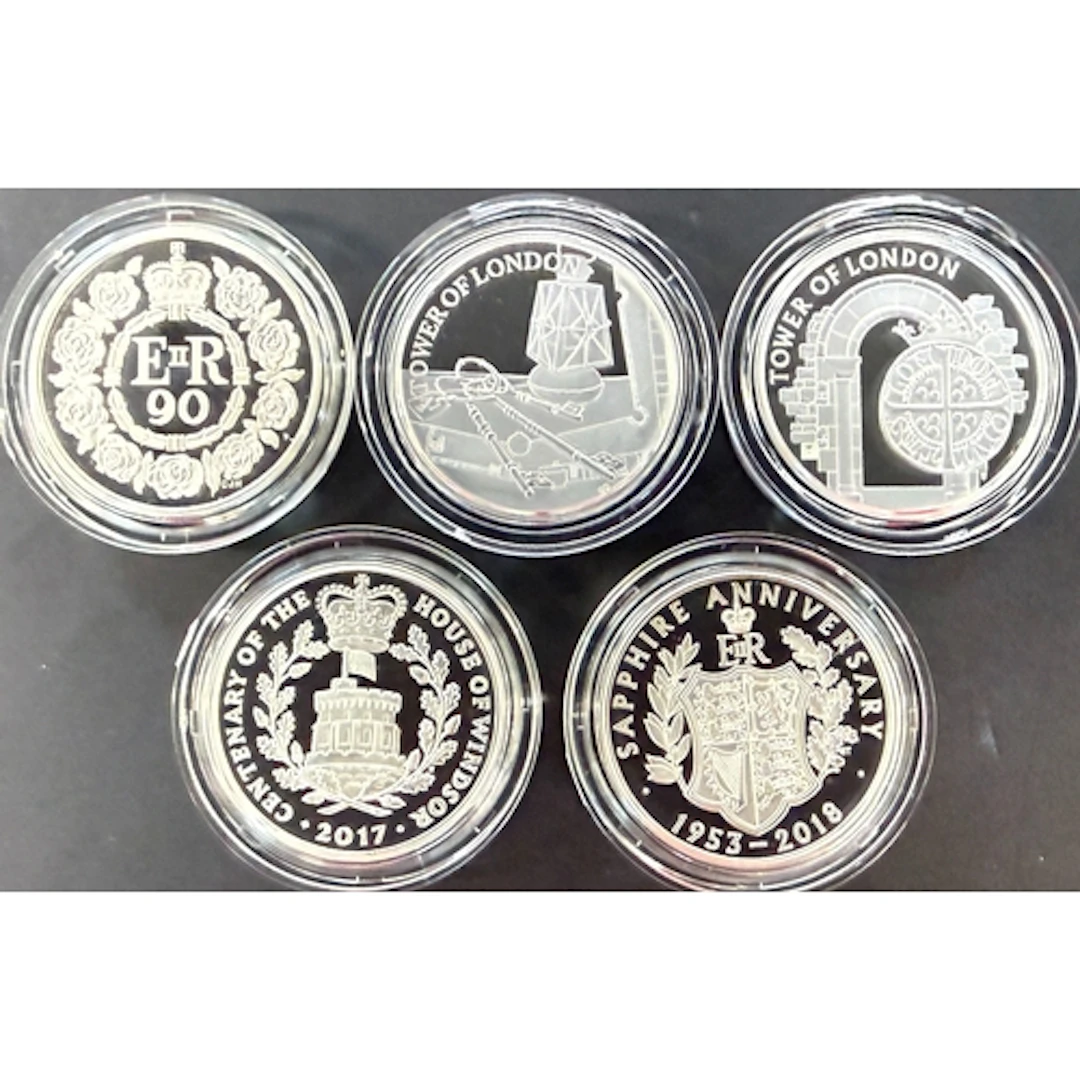 A group of five UK QEII £5 silver proof Piedfort coins, comp...