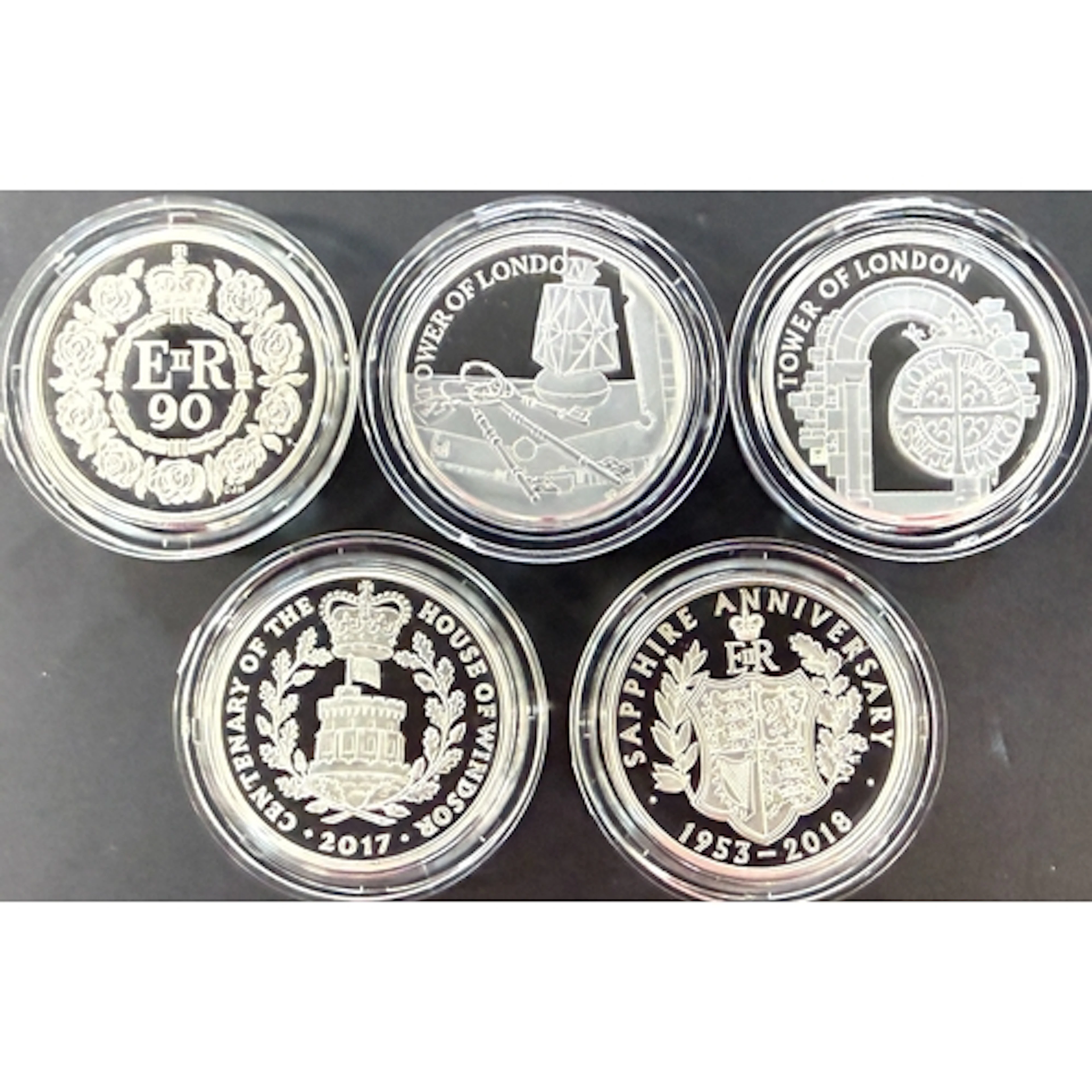 A group of five UK QEII £5 silver proof Piedfort coins, comp...