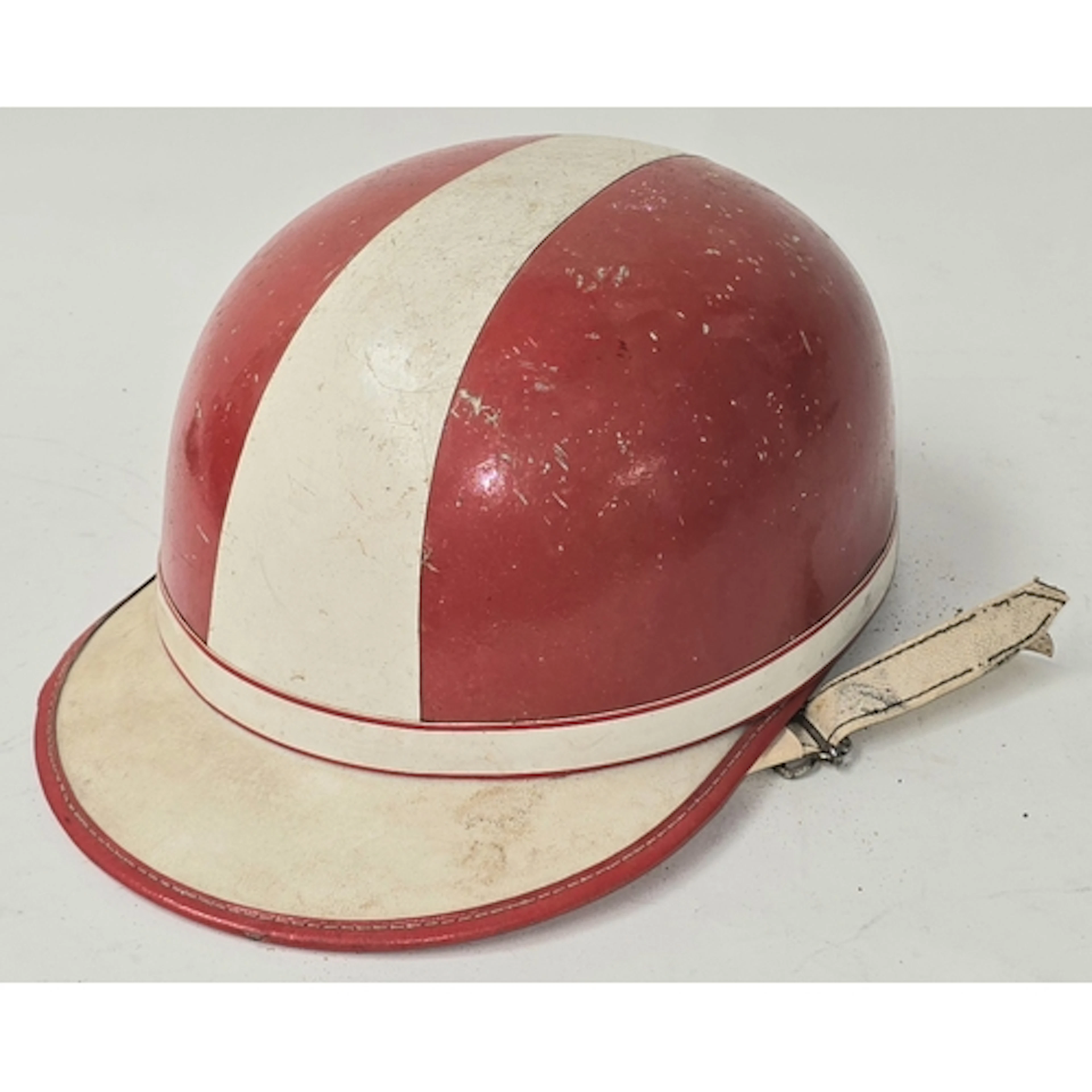 A vintage motorcycle helmet produced by Stadium "The Clipper...