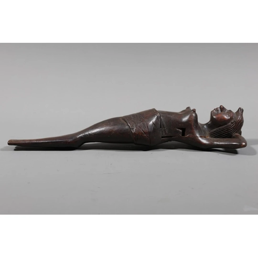 Carved wood nutcracker modelled as a female figure, 33cm.