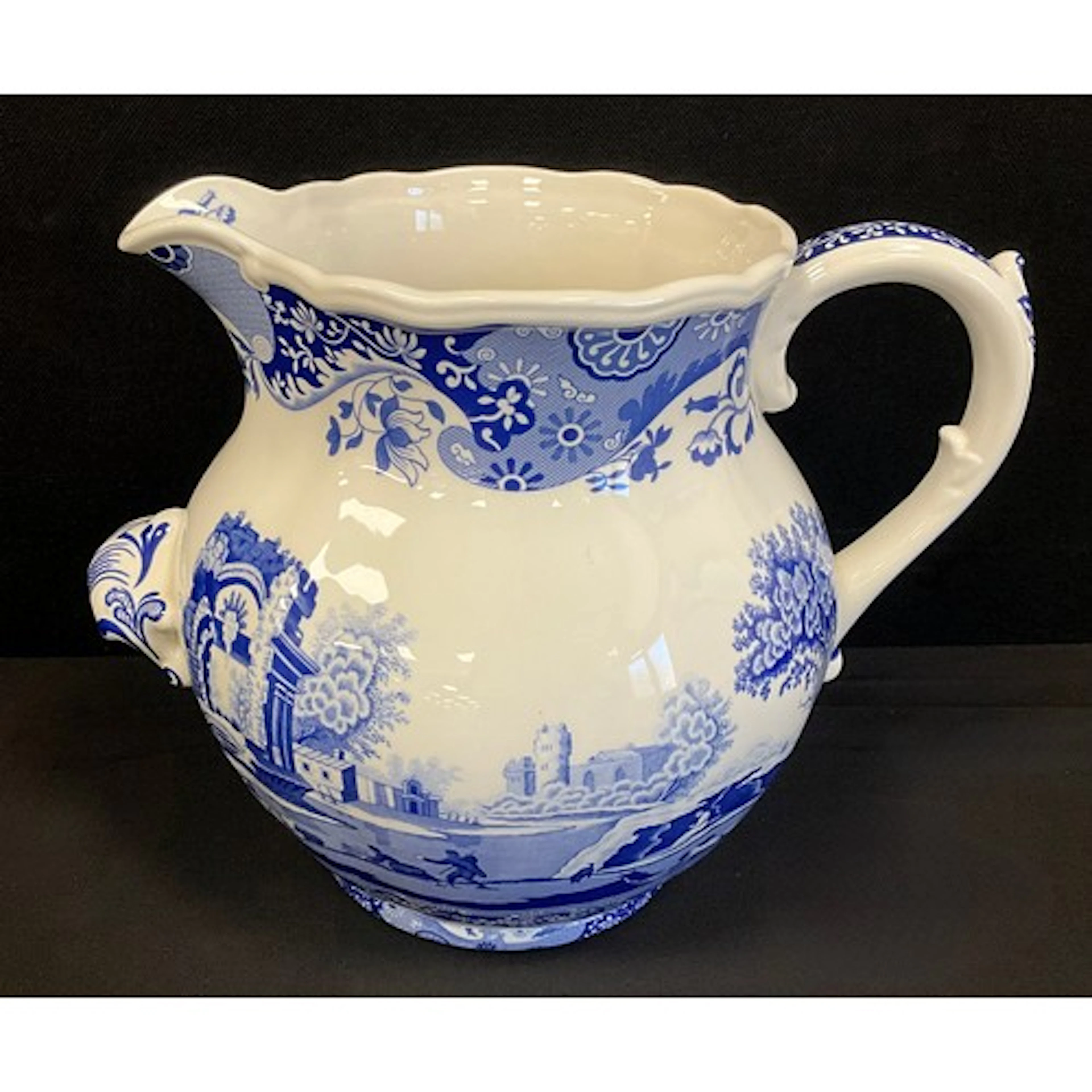 A large Spode Italian blue and white dairy jug, scrolling ha...