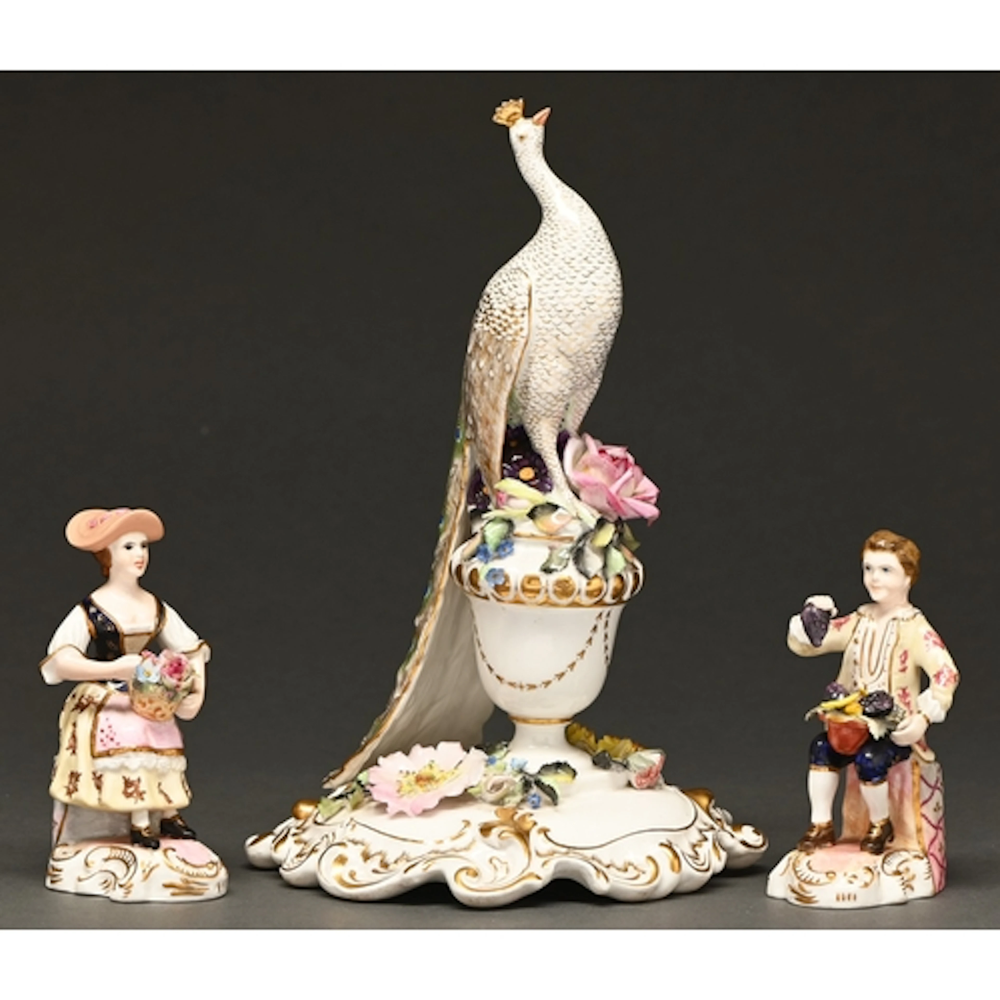 A Royal Crown Derby model of a peacock, 1961, modelled by J....
