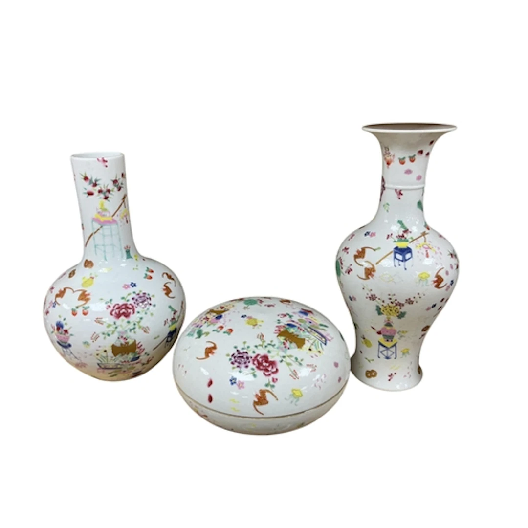 Two Chinese famille rose vases, larger 26cm and a similar bo...