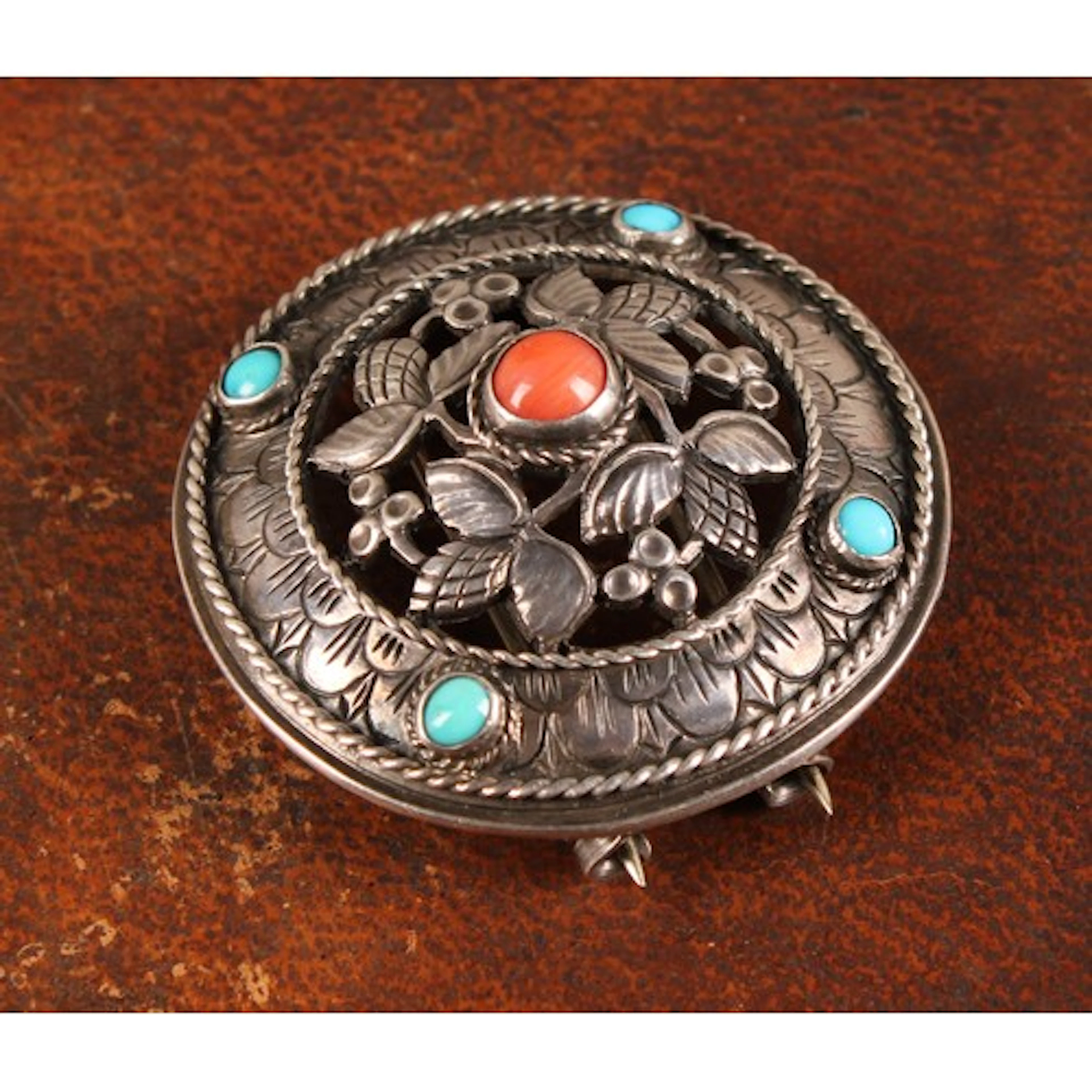 Bernard Cuzner (1877 - 1956) - an Arts and Crafts circular b...