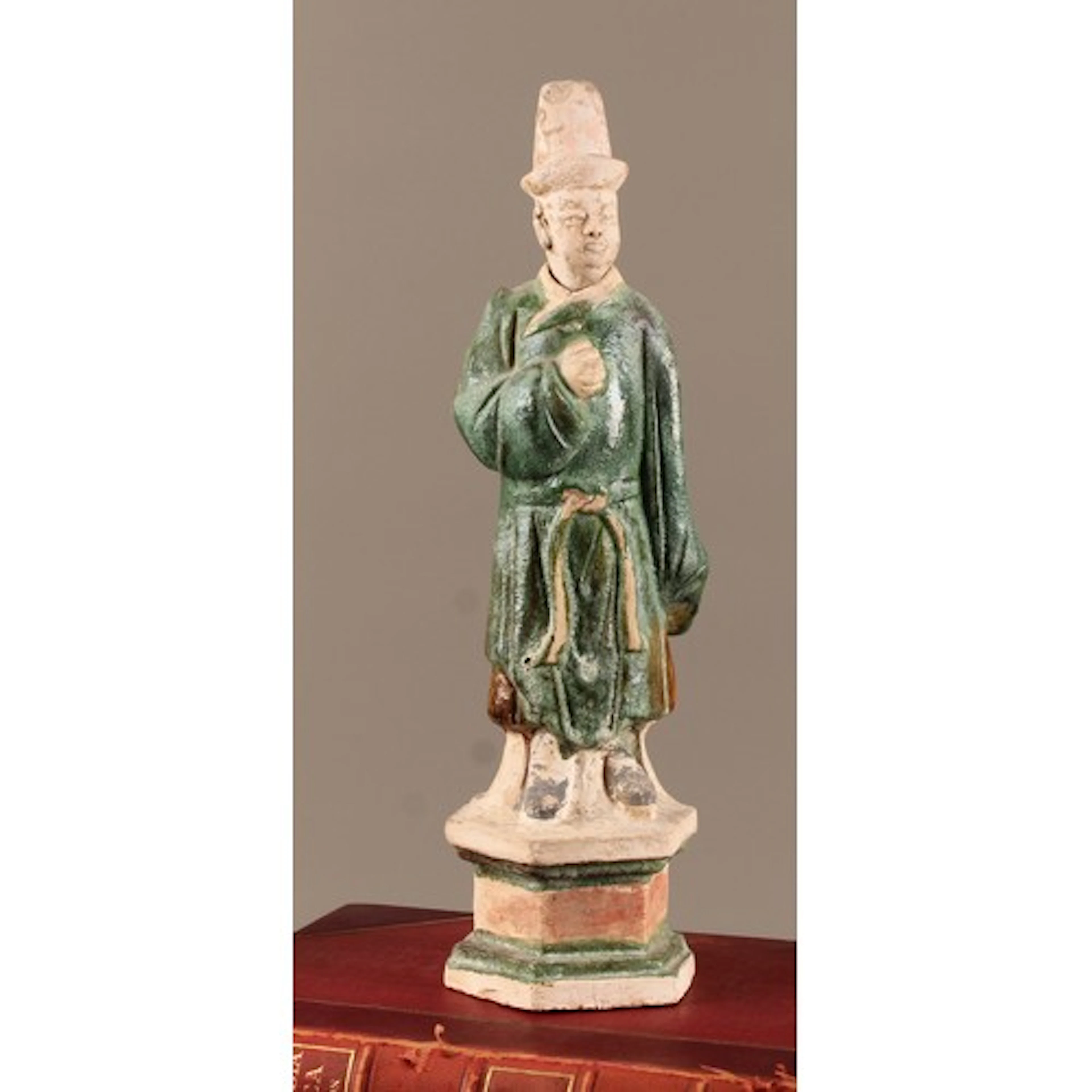 A Chinese Sancai pottery tomb figure, in the Tang Dynasty ta...