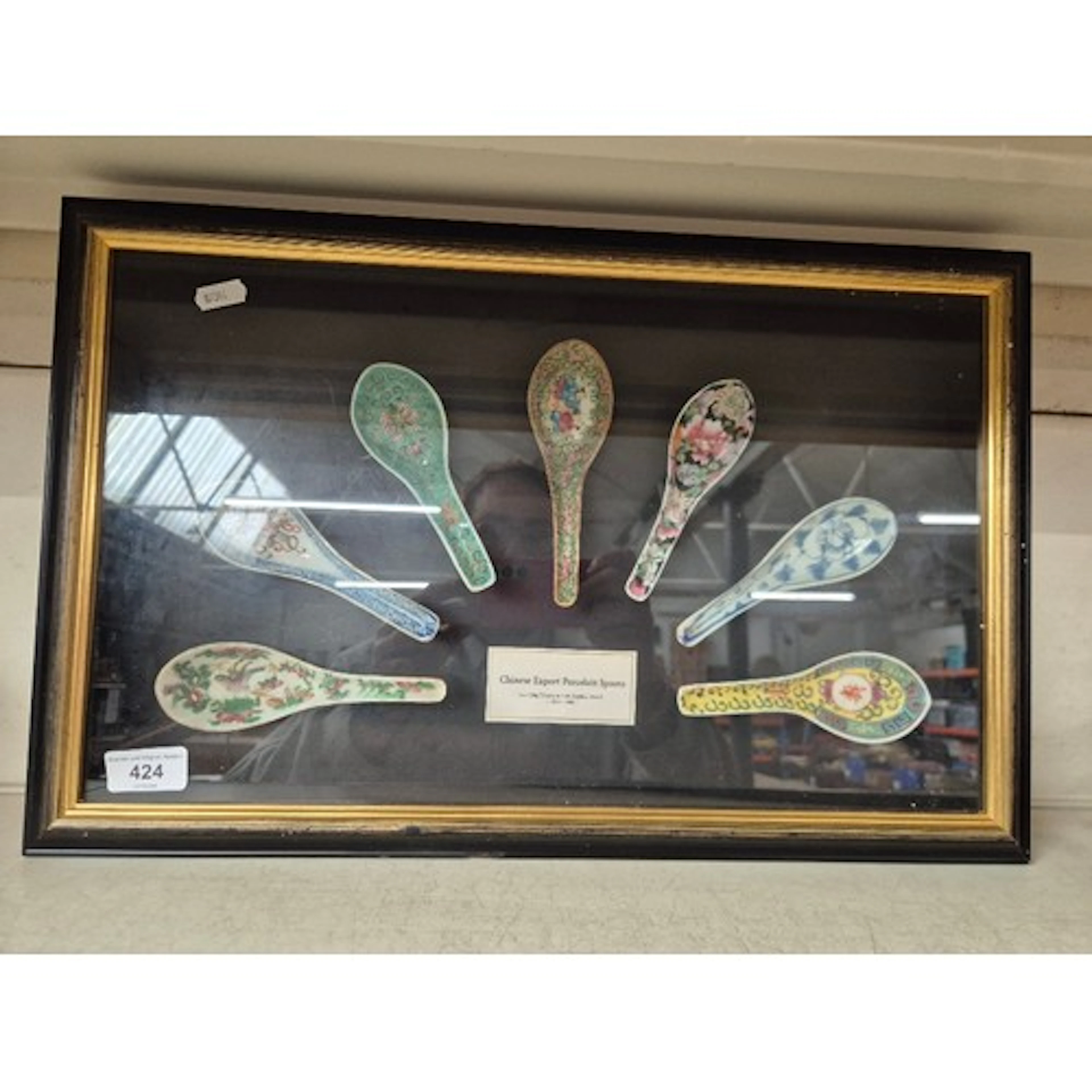 A framed and glazed set of 6 Chinese Export Porcelain Spoons...