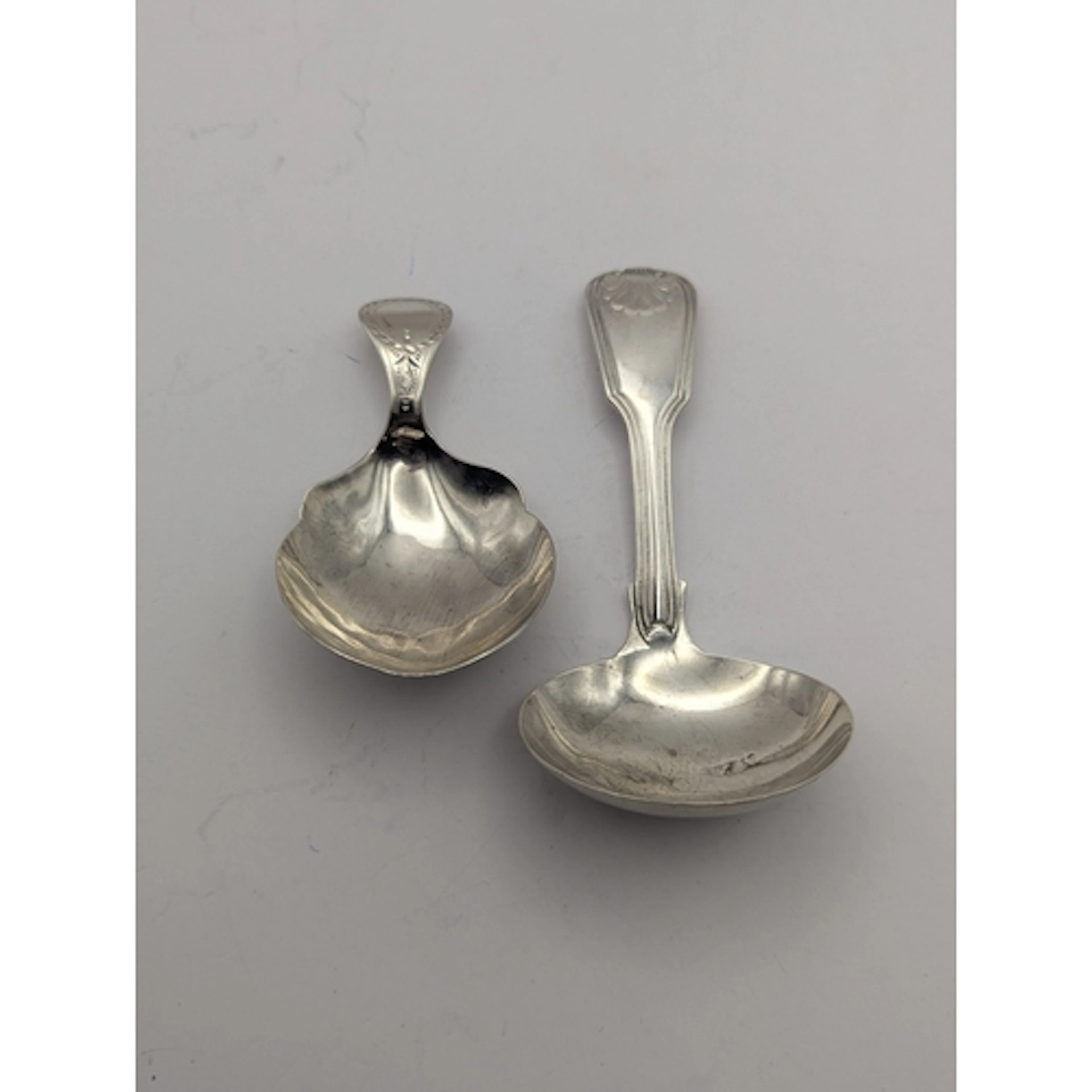 Two George III silver caddy spoons, one example hallmarked L...