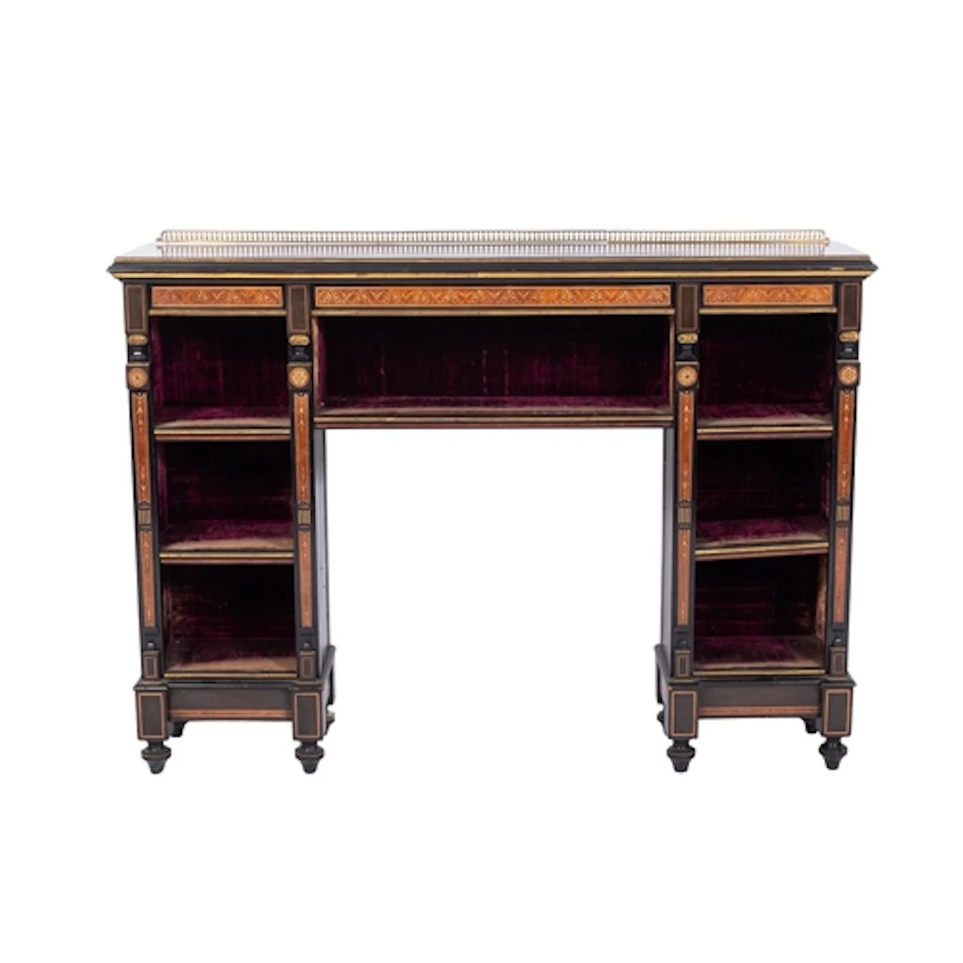 A late Victorian Aesthetic movement ebonised, maple and gilt...