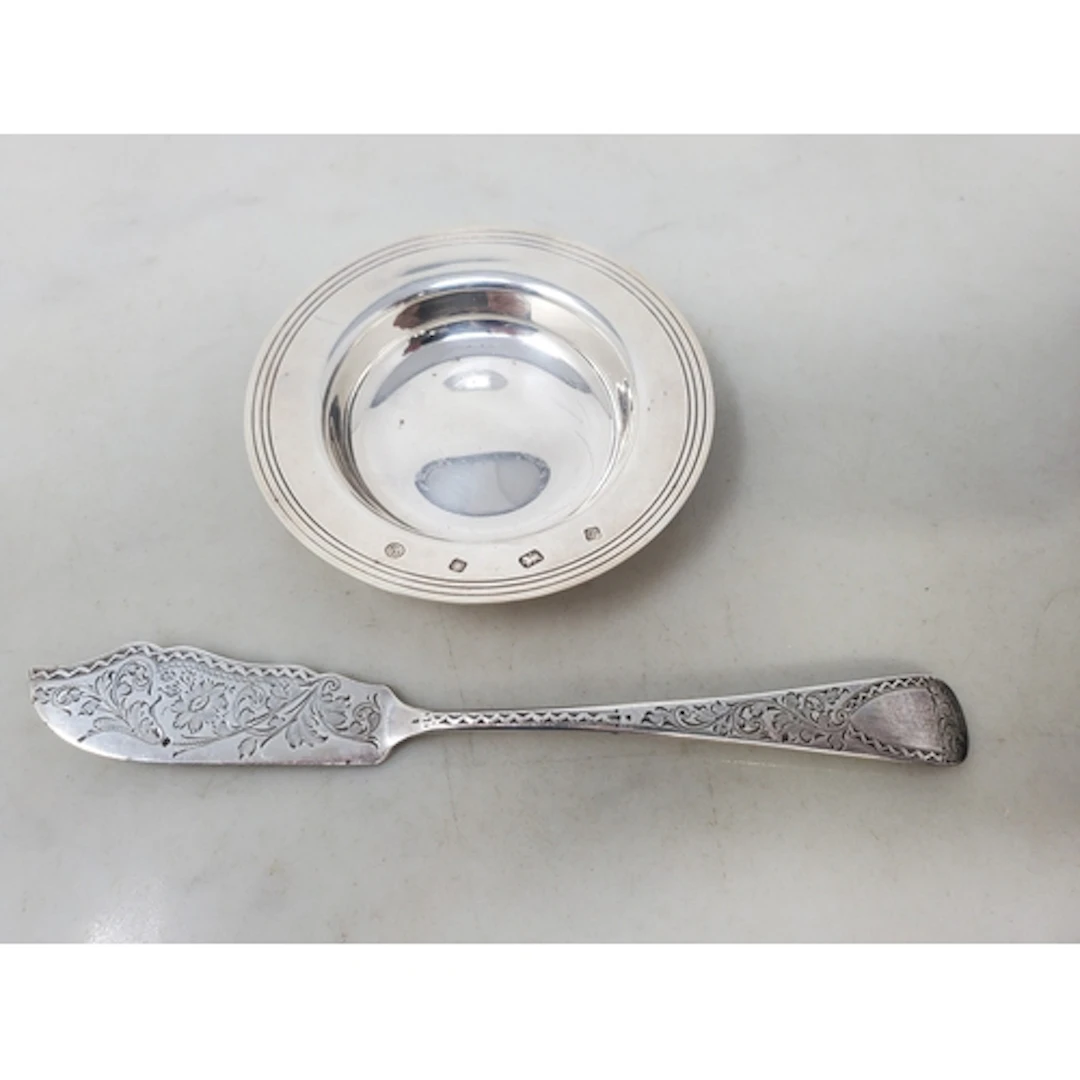 A Victorian silver Butter Knife with floral and leafage engr...