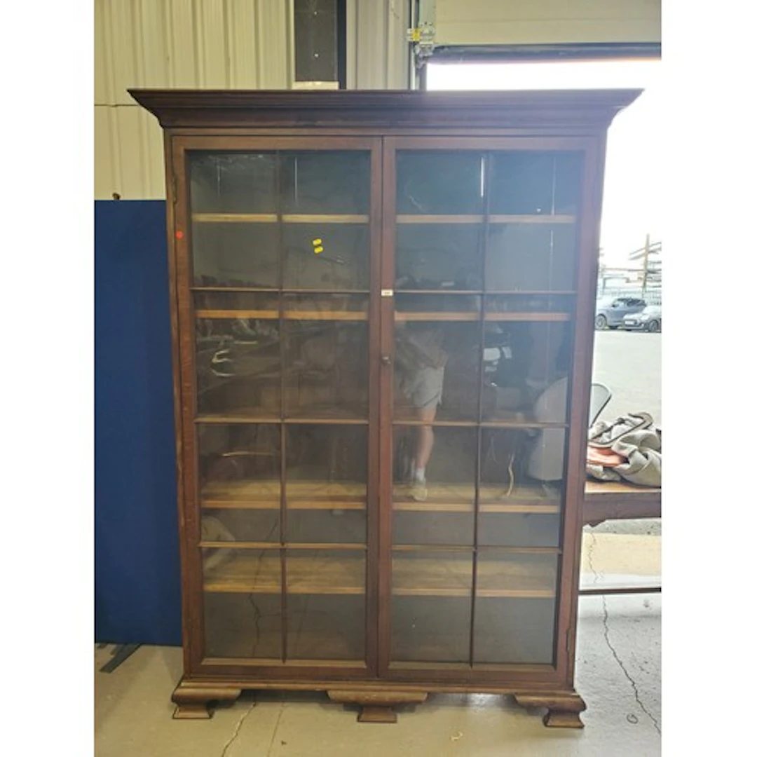 A tall oak Bookcase fitted pair of glazed doors enclosing fi...