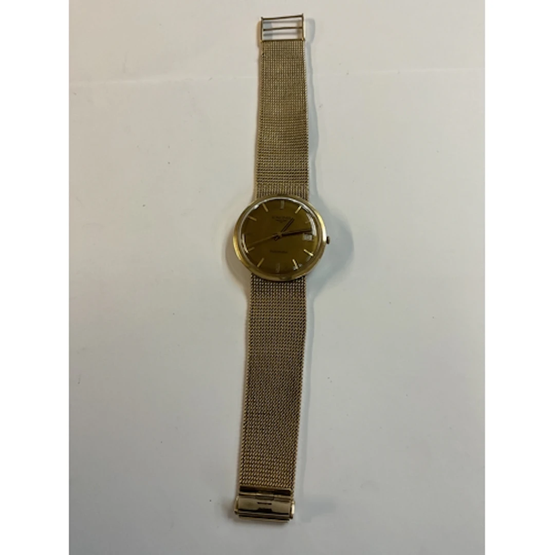 A 9ct gold Longines gents wristwatch, complete with a 9 ct g...