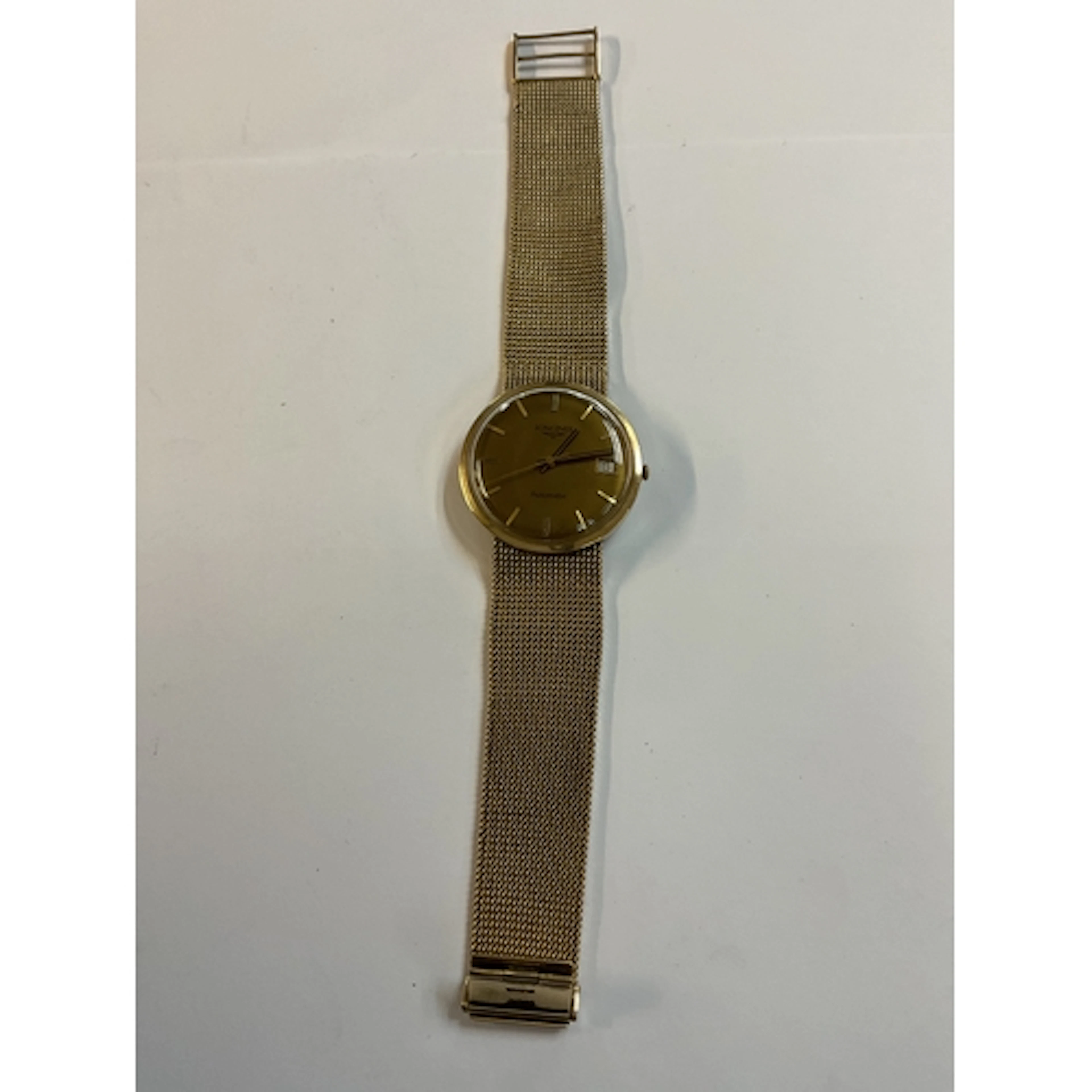 A 9ct gold Longines gents wristwatch, complete with a 9 ct g...