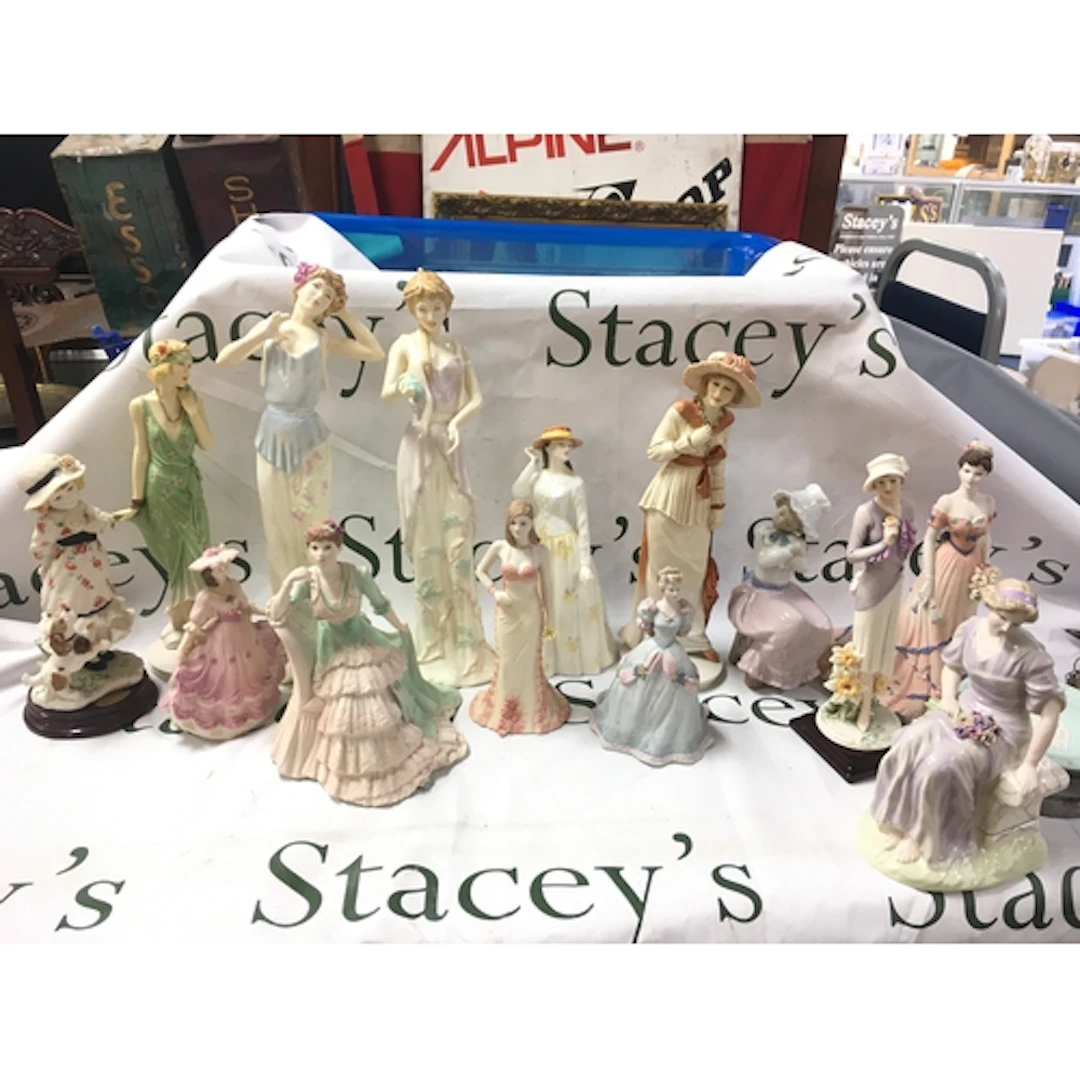 A collection of various figures including Wedgwood, Coalport...