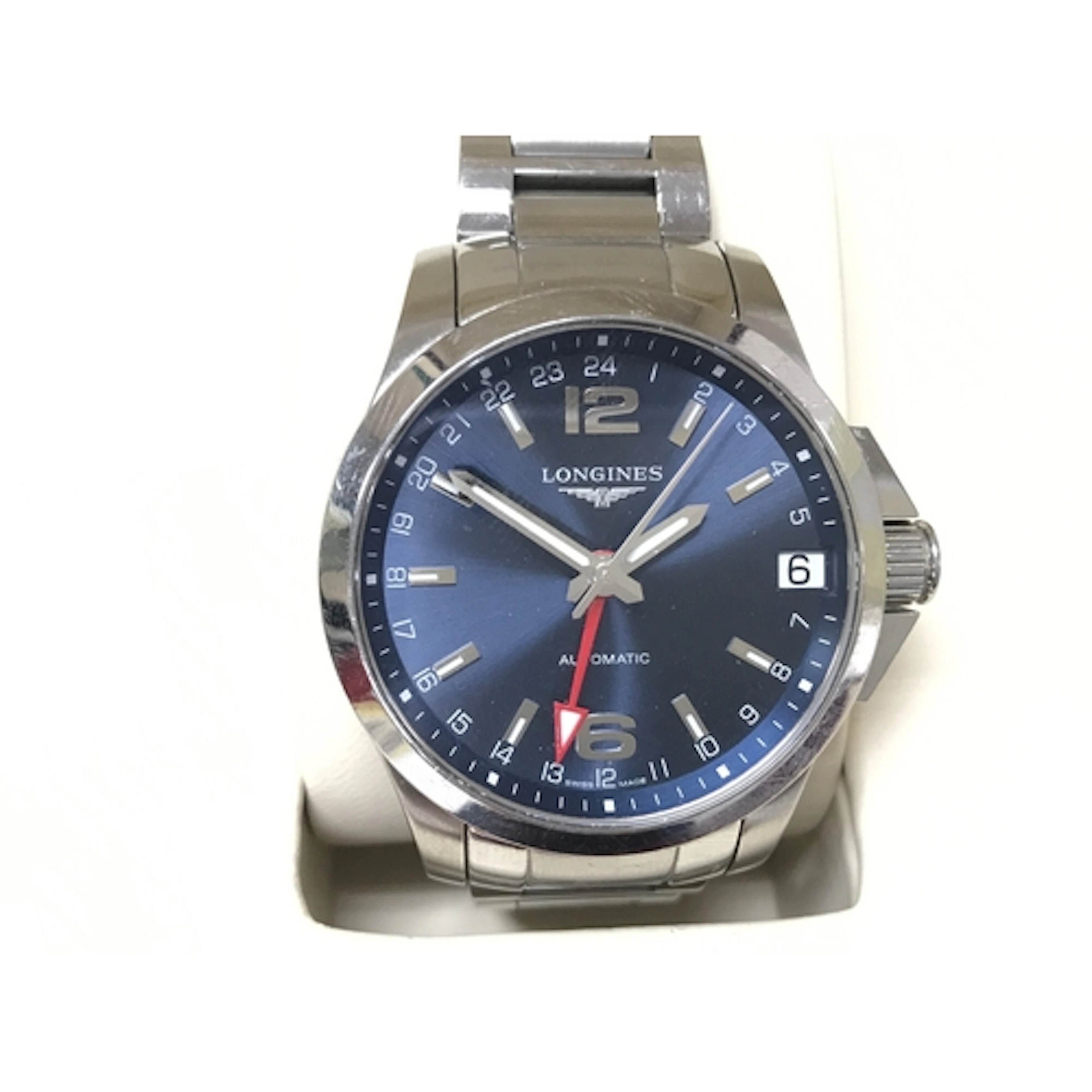 Longines Conquest GMT watch. blue dial and a red GMT hand. S...