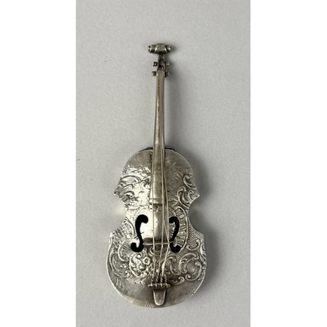 A SILVER MODEL OF A GUITAR 10.5cm L Weight: 40gms...