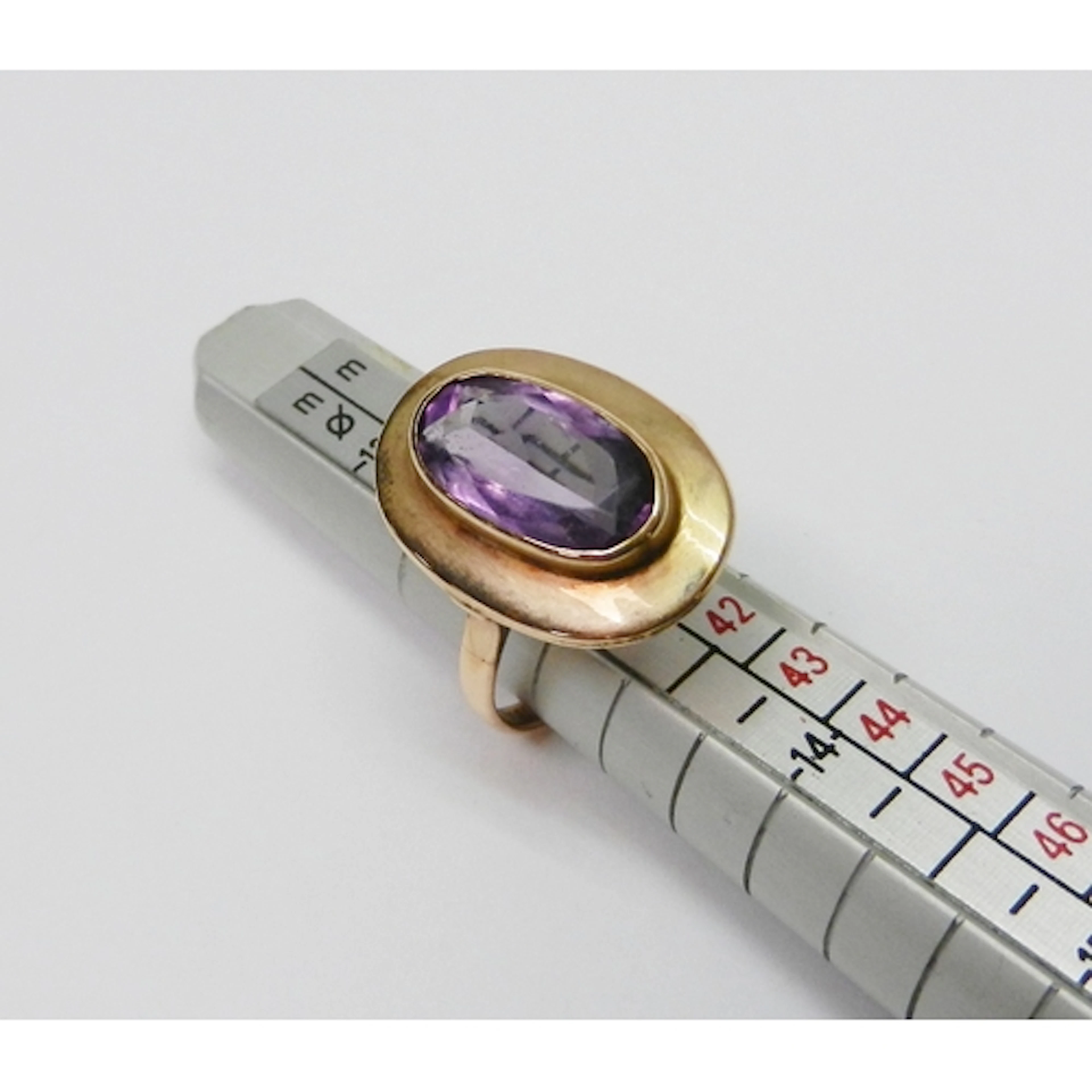 A statement ring, yellow metal marked 18k set with a single ...