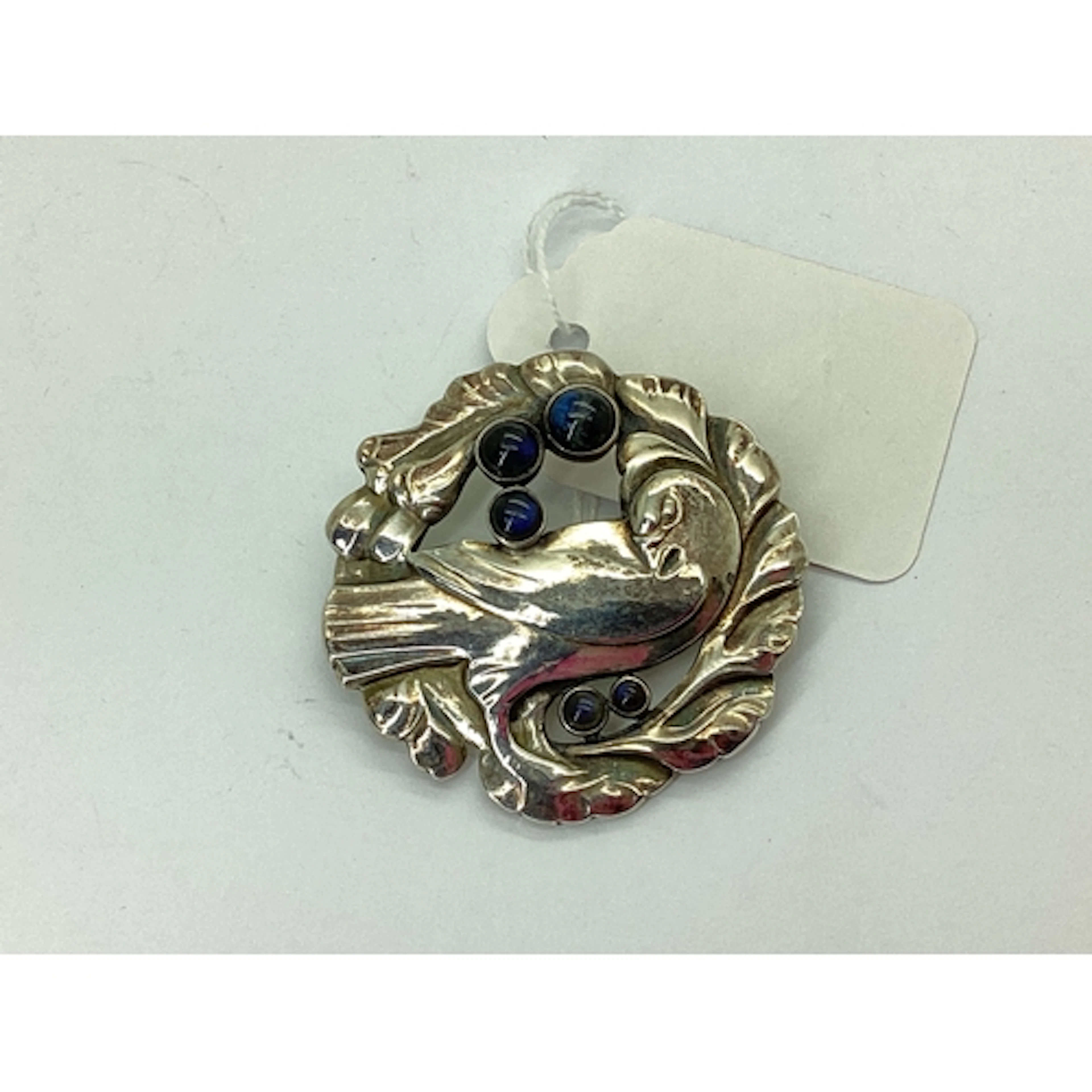 Georg Jensen; A Cabochon Inset Dove Brooch, numbered 123, of...