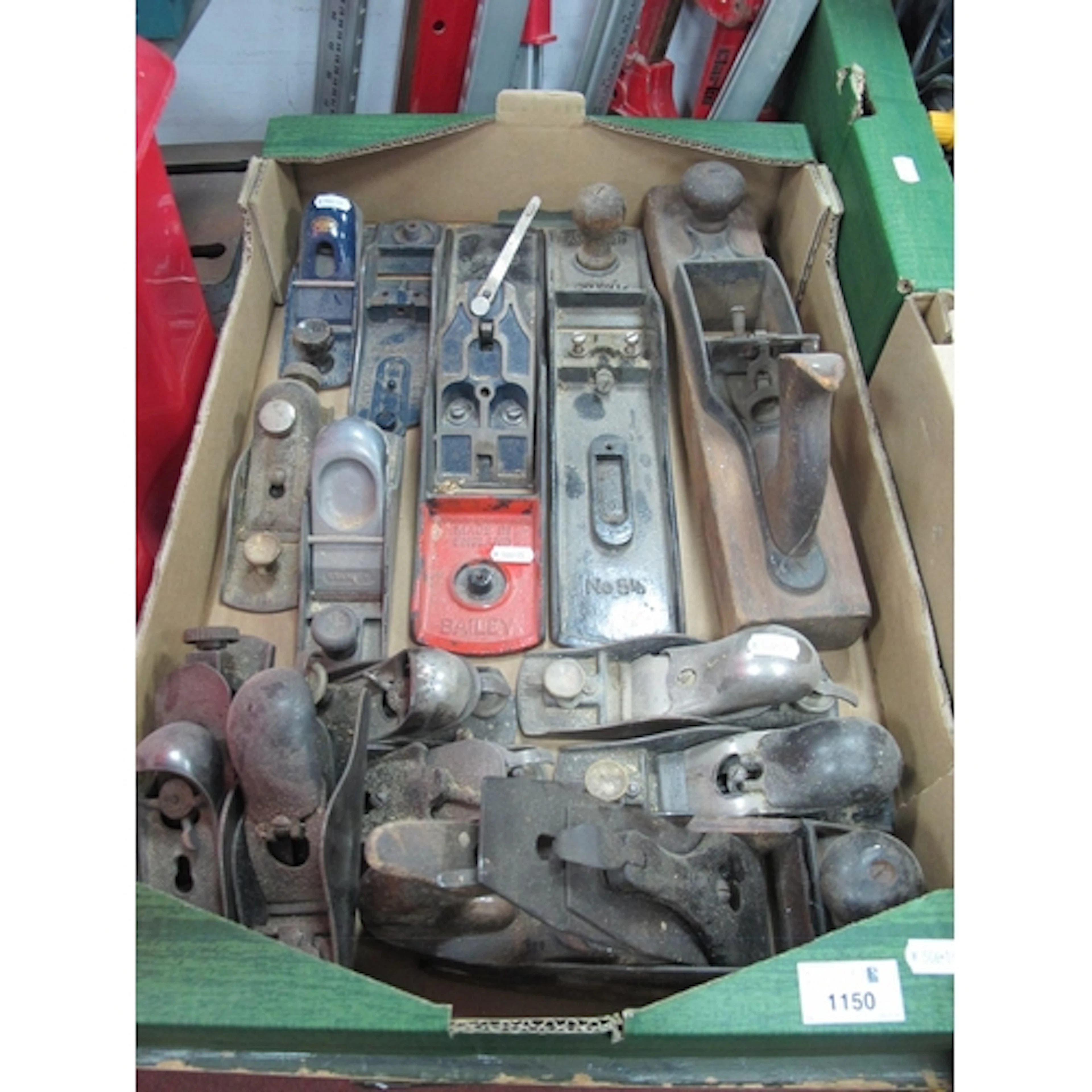 Collection of vintage woodworking hand planes, including Rec...