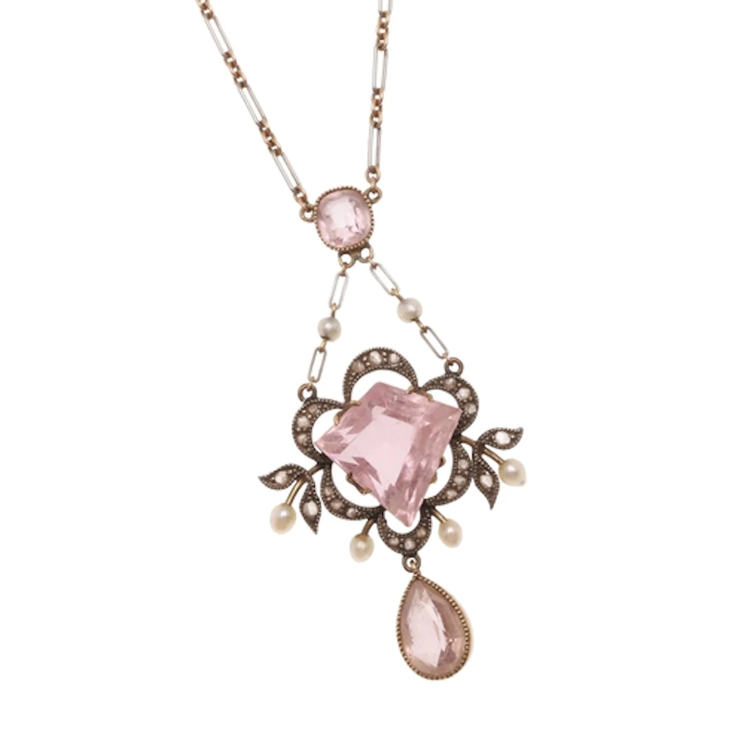 AN EARLY 20TH CENTURY PINK TOURMALINE AND DIAMOND PENDANT. t...