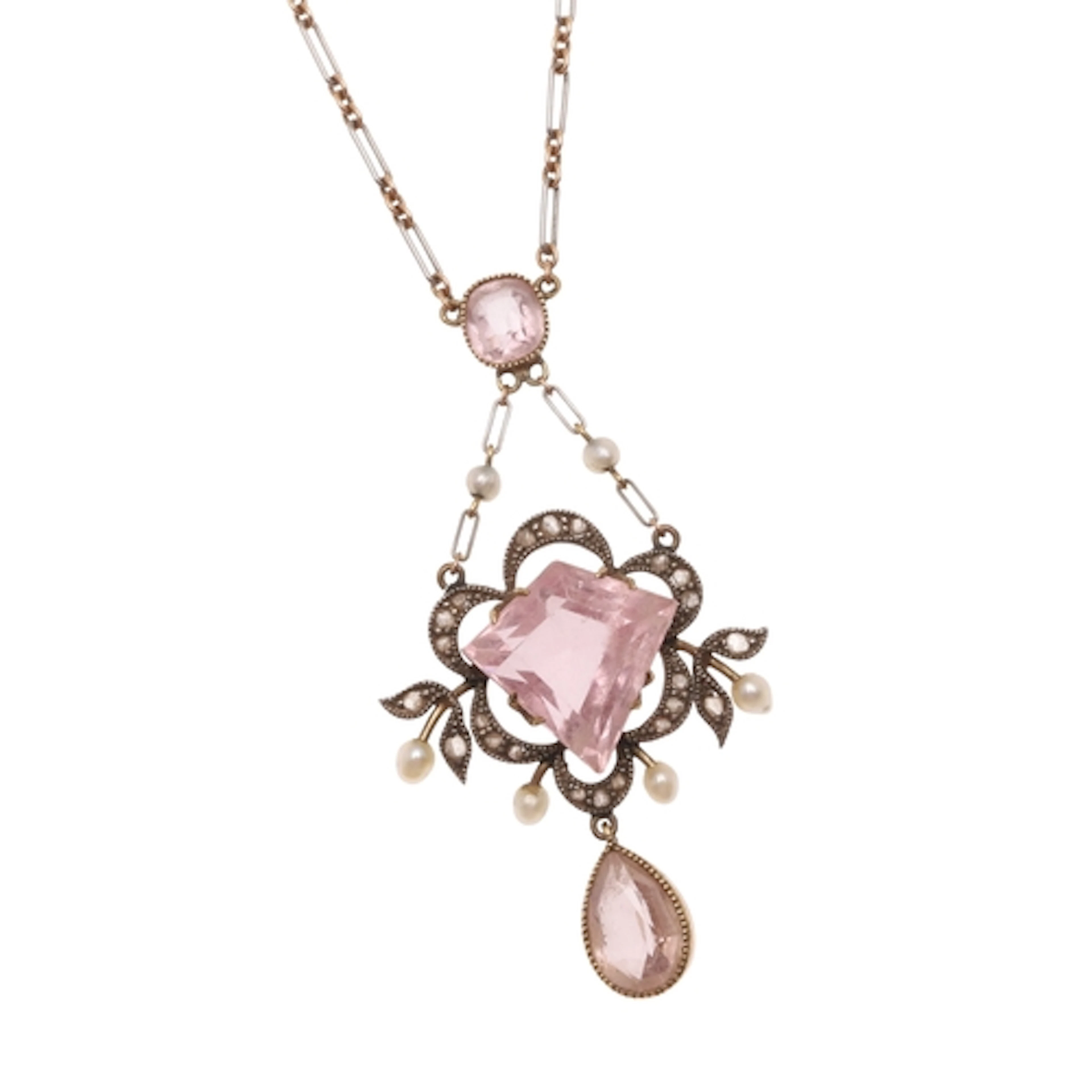 AN EARLY 20TH CENTURY PINK TOURMALINE AND DIAMOND PENDANT. t...