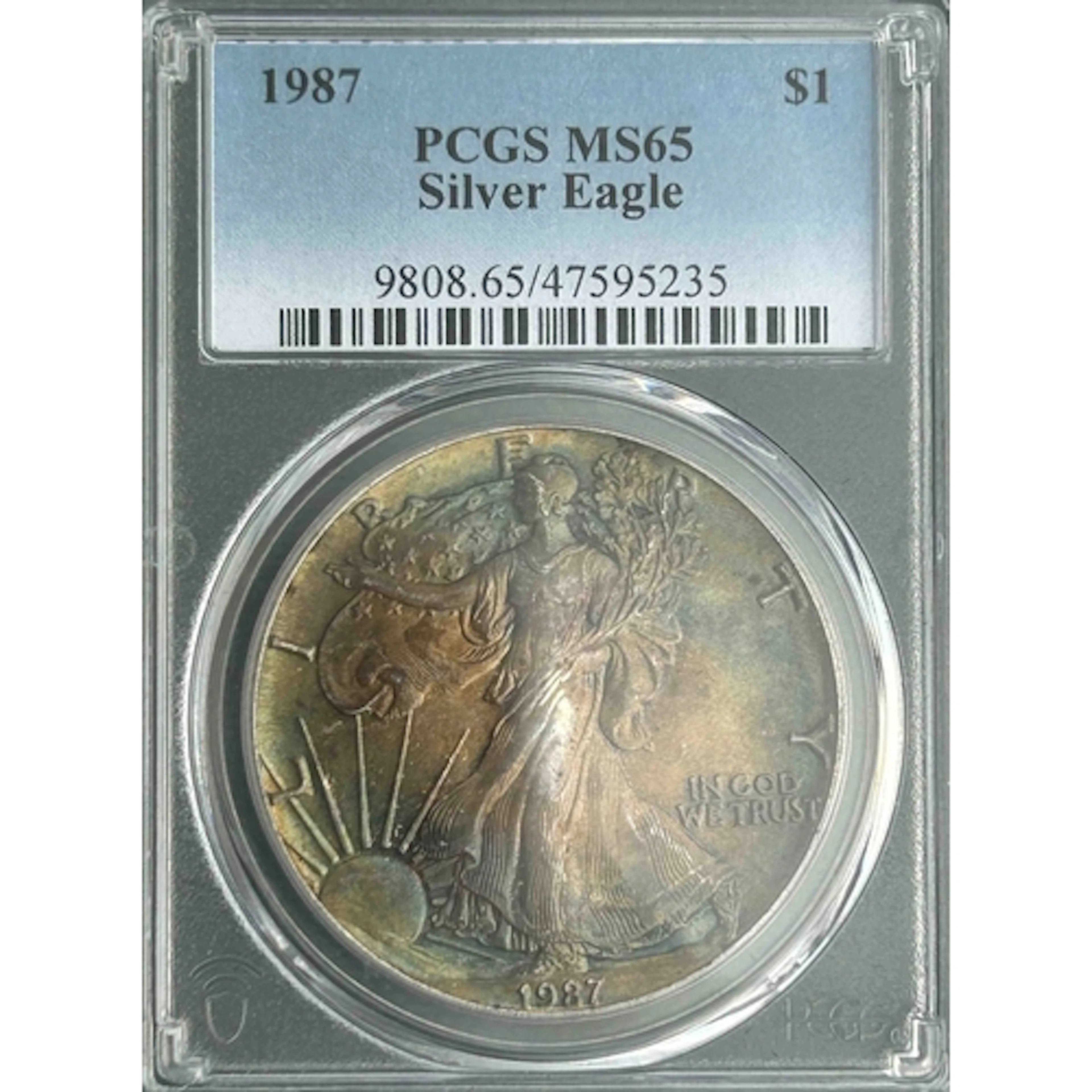 1987 USA $1 silver Eagle coin, slabbed and graded by P.C.G.S...