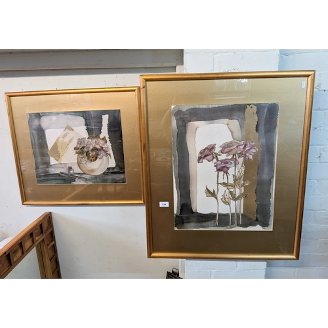A pair of modern gilt framed art prints of flowers in gilt f...