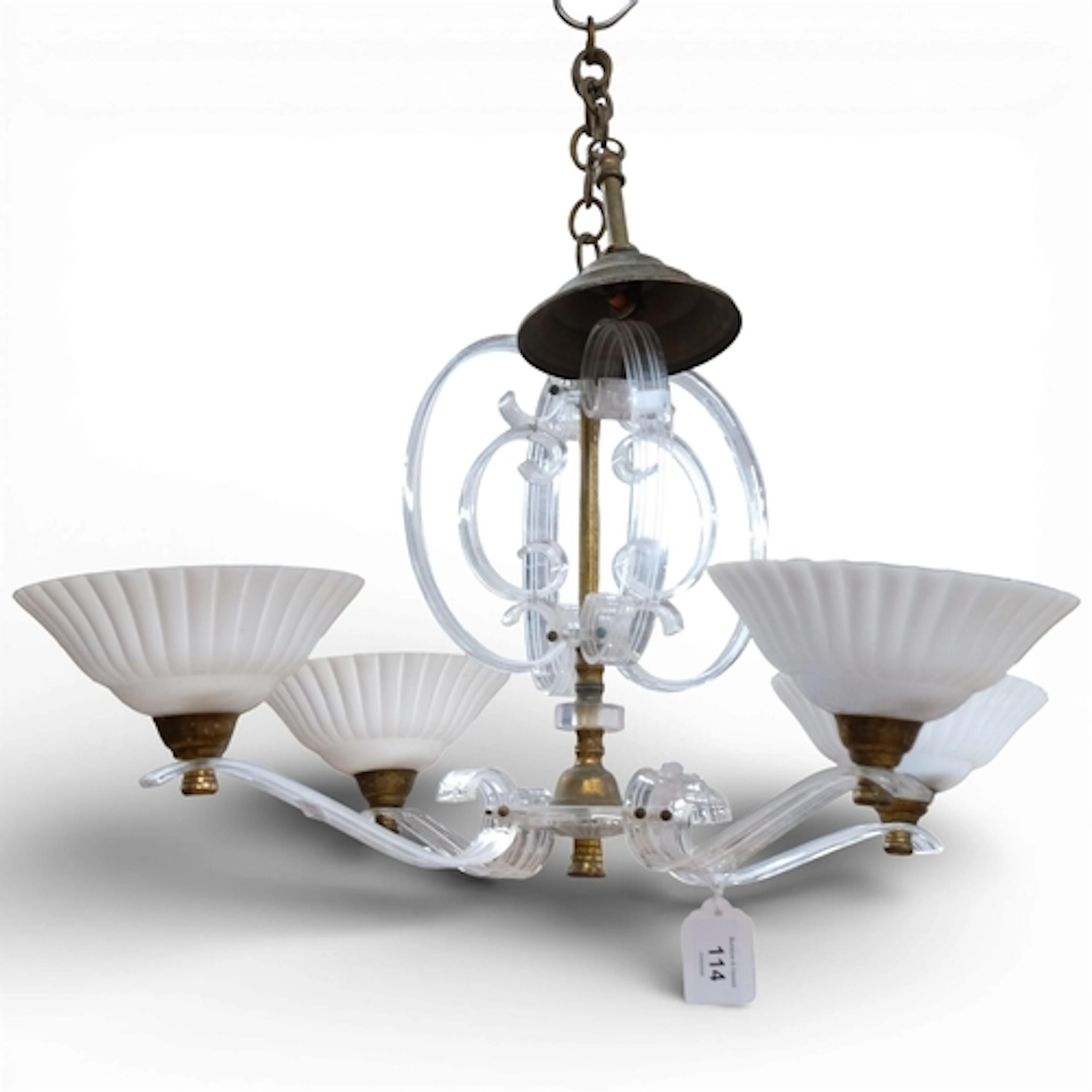 A contemporary 4-branch hanging lucite chandelier, designed ...