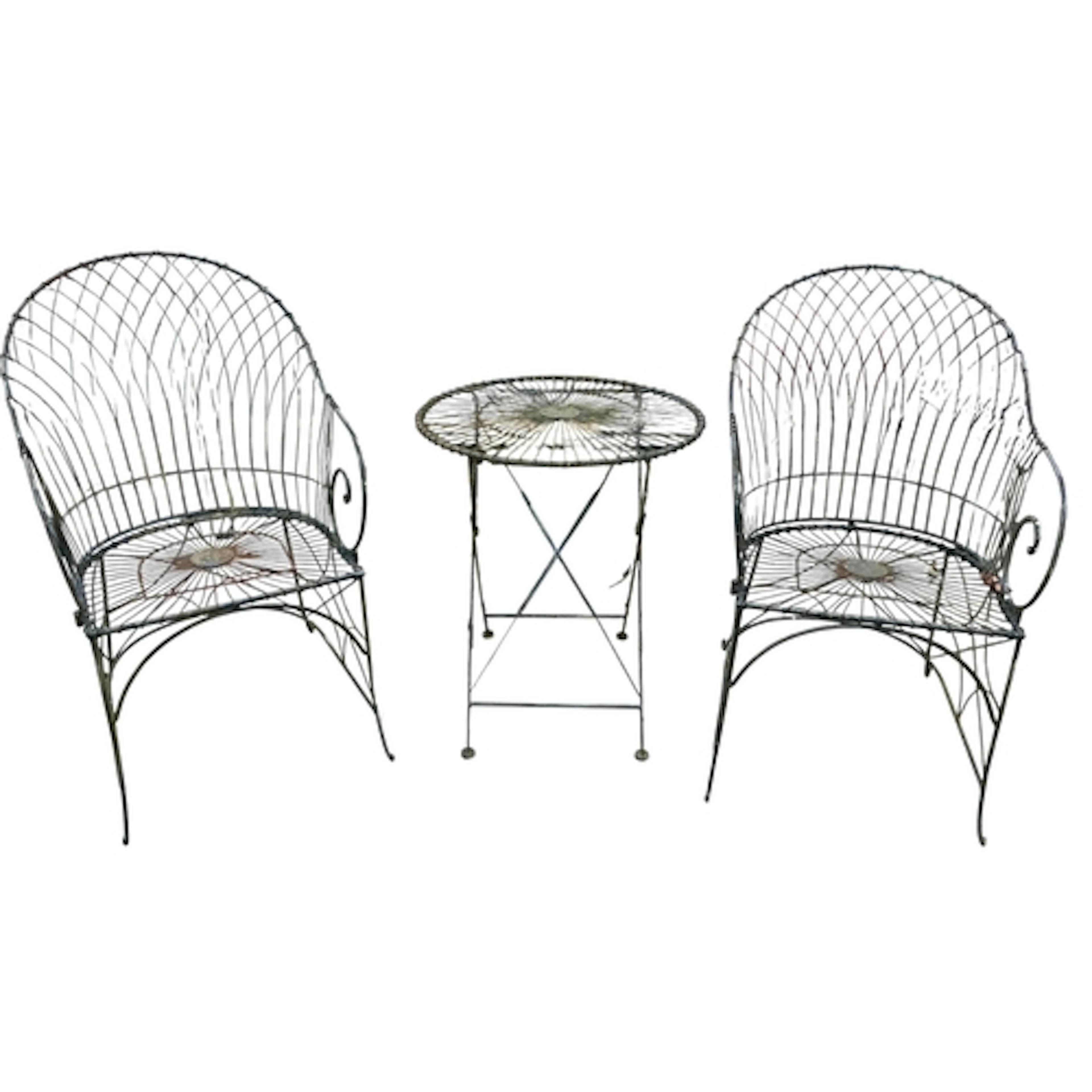 A painted wirework circular folding garden table, diameter 6...